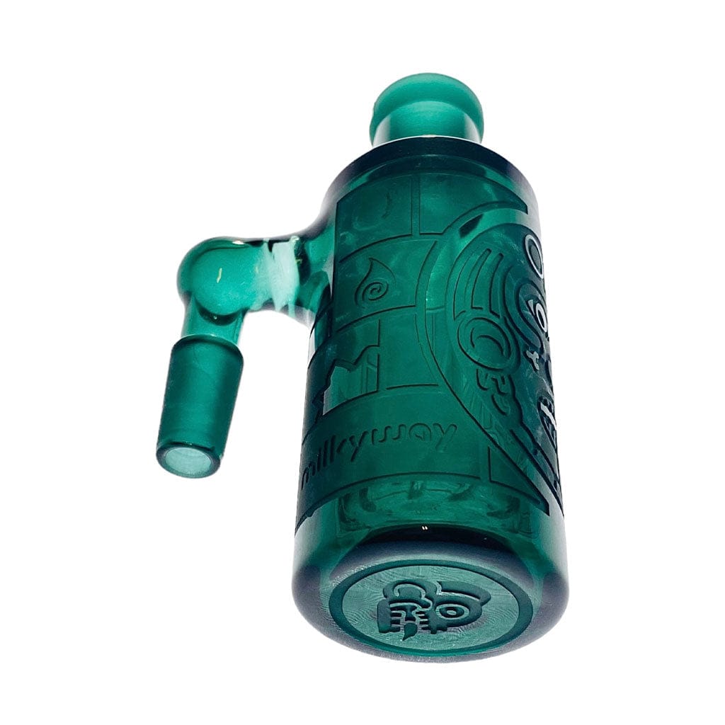 Angled low-shot of the teal Milkyway Maya Wet Ash Catcher showing its side handle, etched Maya-inspired design, and rounded base.