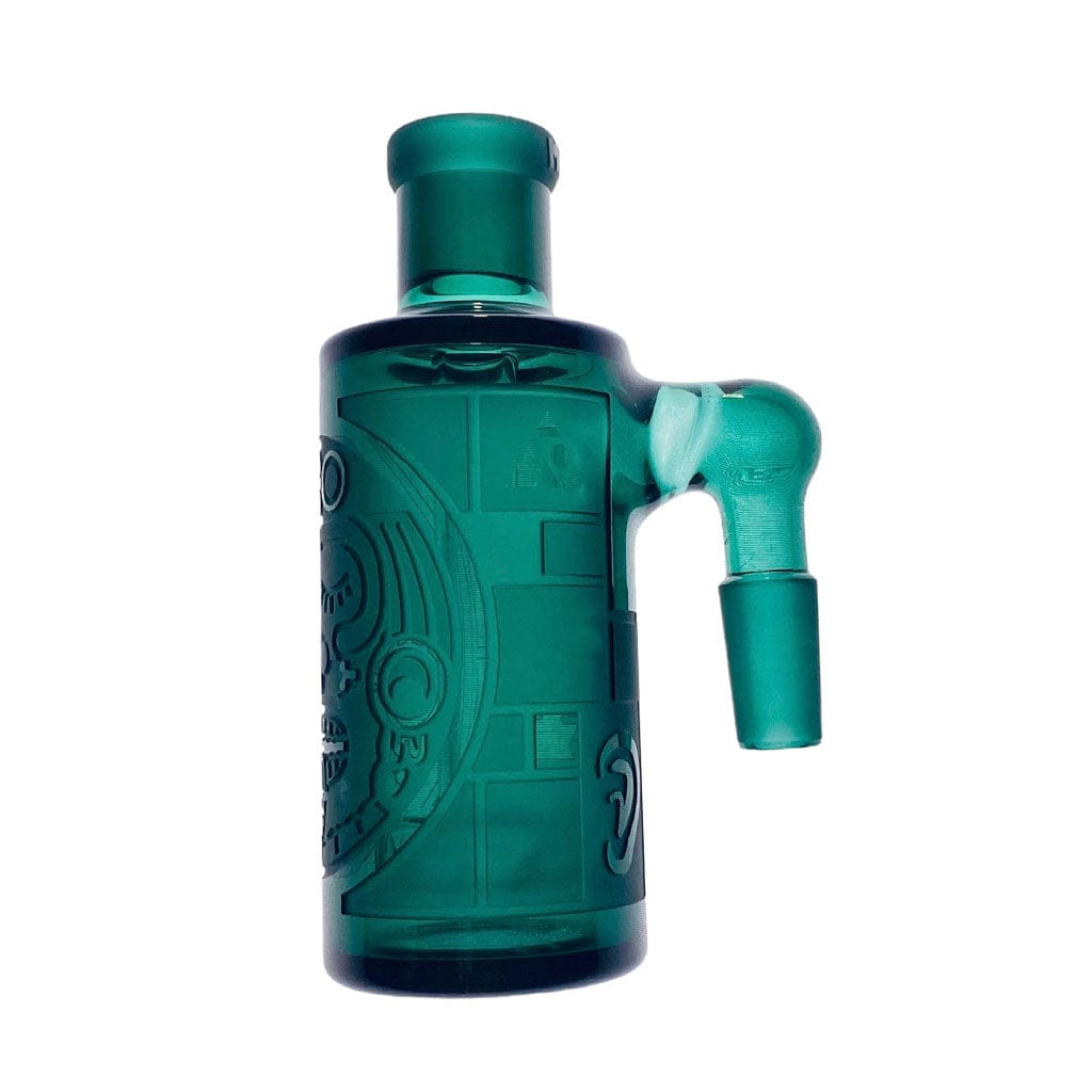 Studio-style front view of the teal Milkyway Maya Wet Ash Catcher showing its embossed Mayan face pattern and side joint against a white background.