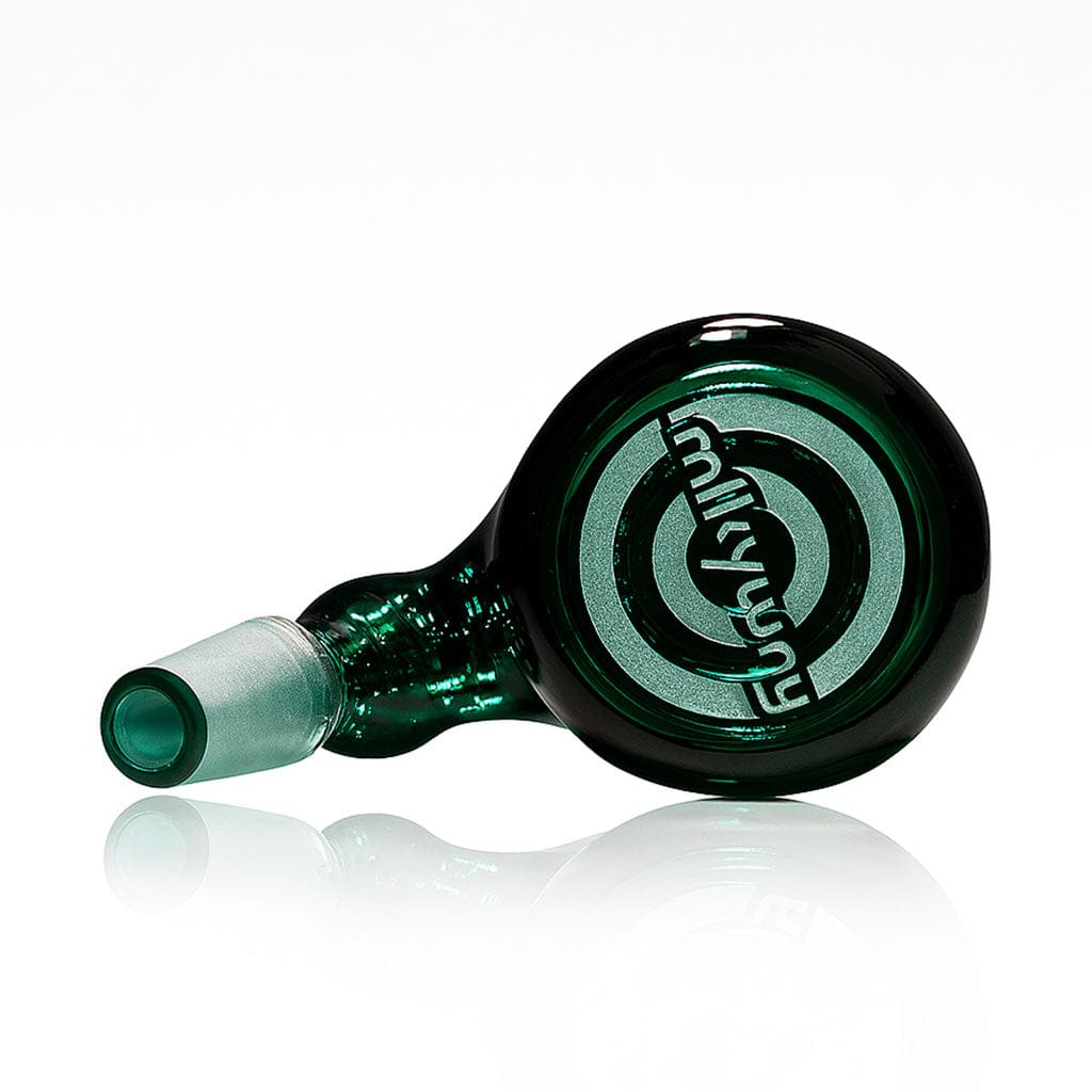 Angled close-up of the green Milkyway Universe Ash Catcher lying on its side with its circular logo facing the camera and a soft reflection beneath.