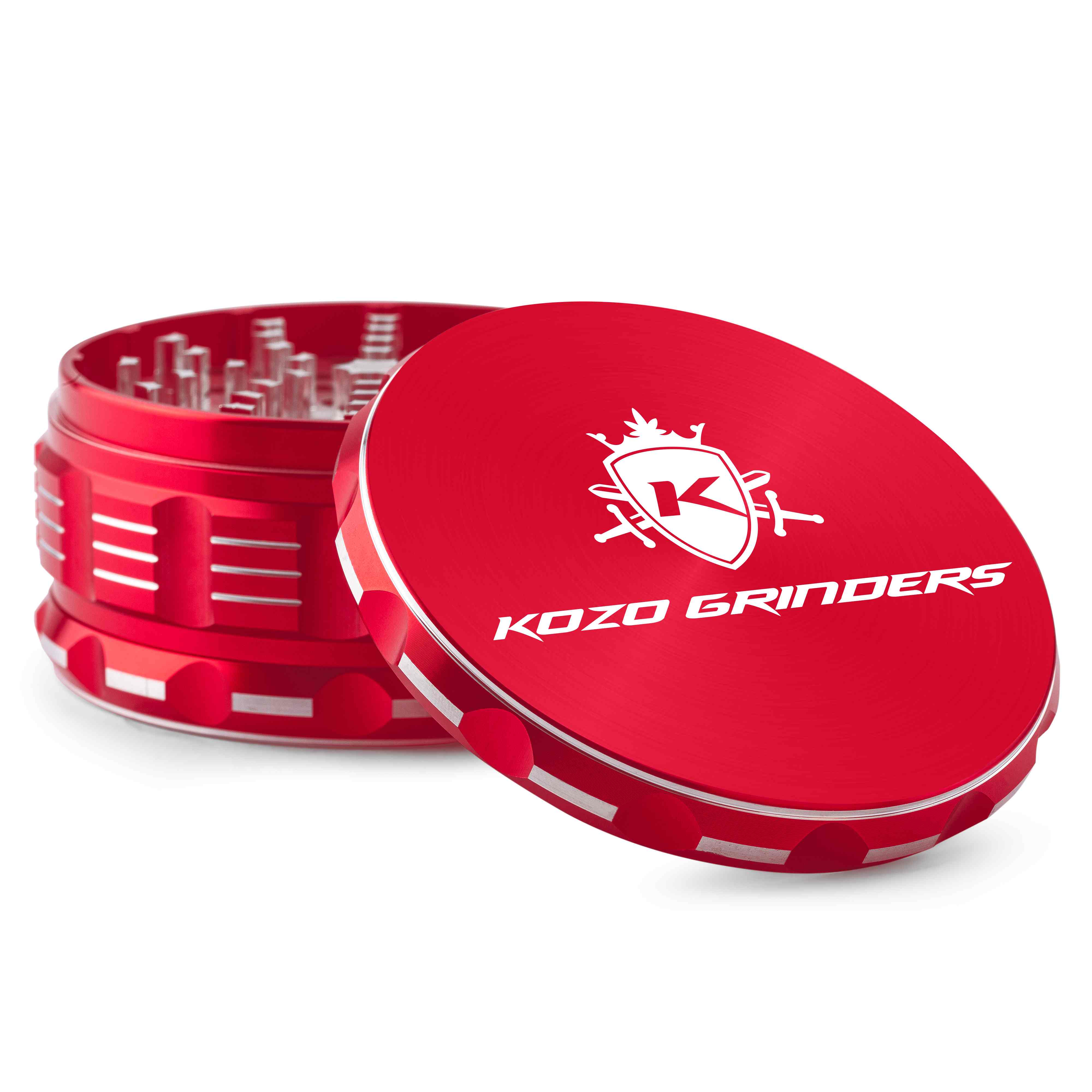 Close-up angled view of the red Kozo Grinder 4" showing the textured rim, internal teeth, and white logo on the lid.