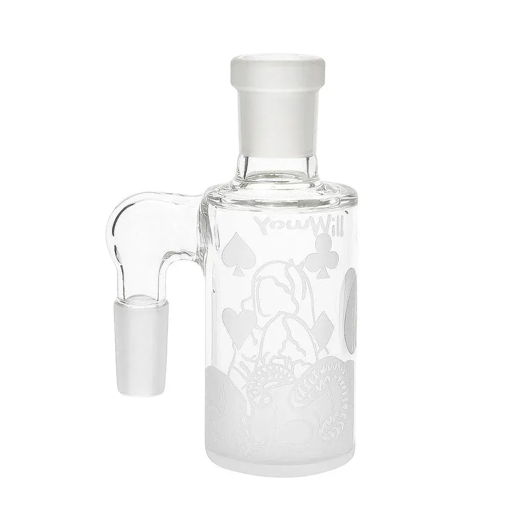 Clear studio-front view of the Milkyway Emperor’S Legacy Wet Ash Catcher showing its cylindrical glass body, side joint, and etched playing-card and floral designs.