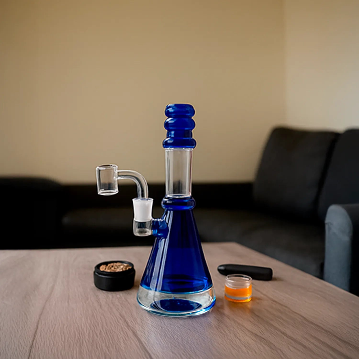 Center-framed DHC Transparent Neck Bong with Bowl & Banger in teal glass on a wooden table with a blurred sofa background.