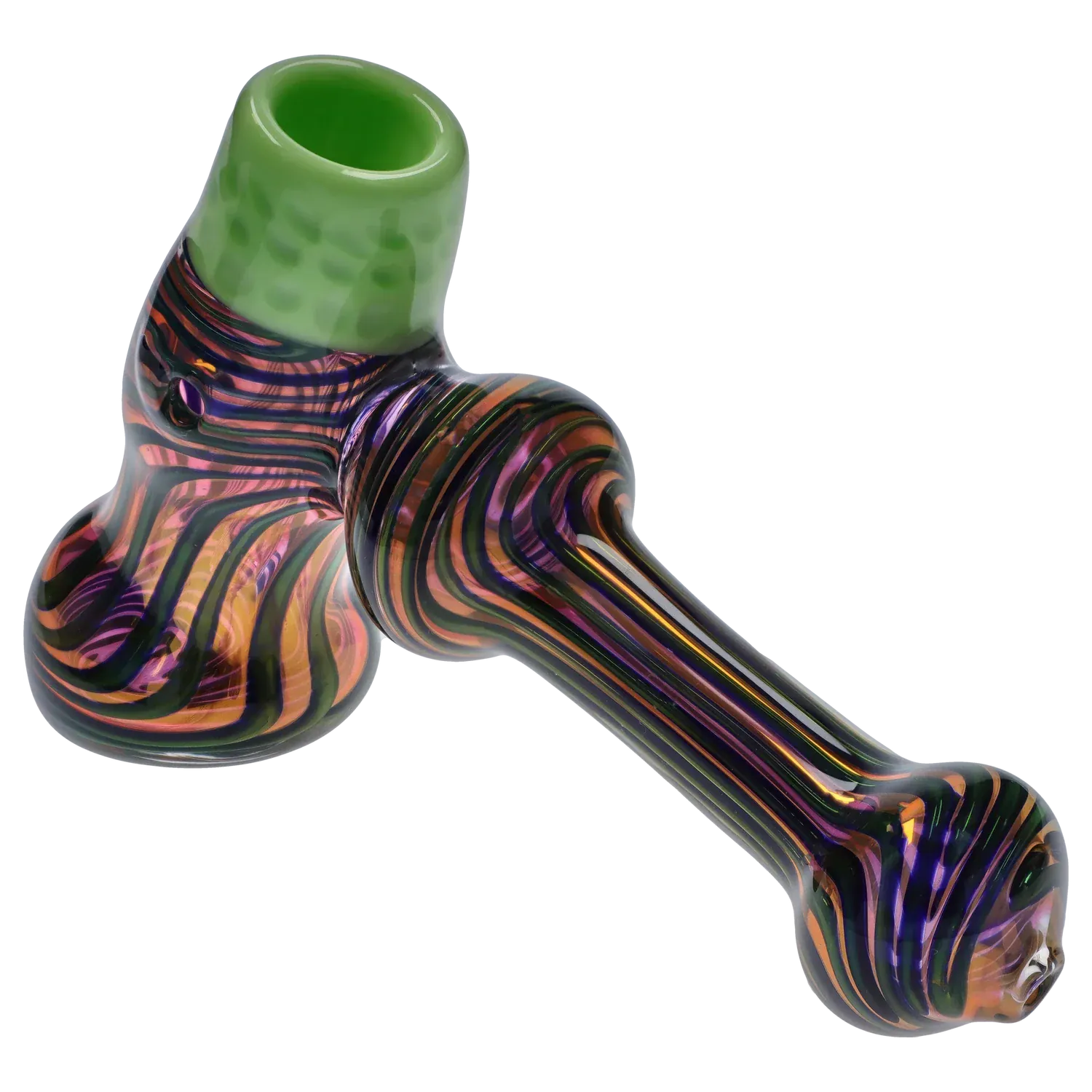 Angled close-up of the DHC Gold Fume Hammer Bubbler - 7 in., showing a green bowl atop iridescent purple, orange, and black striped glass against a pale background