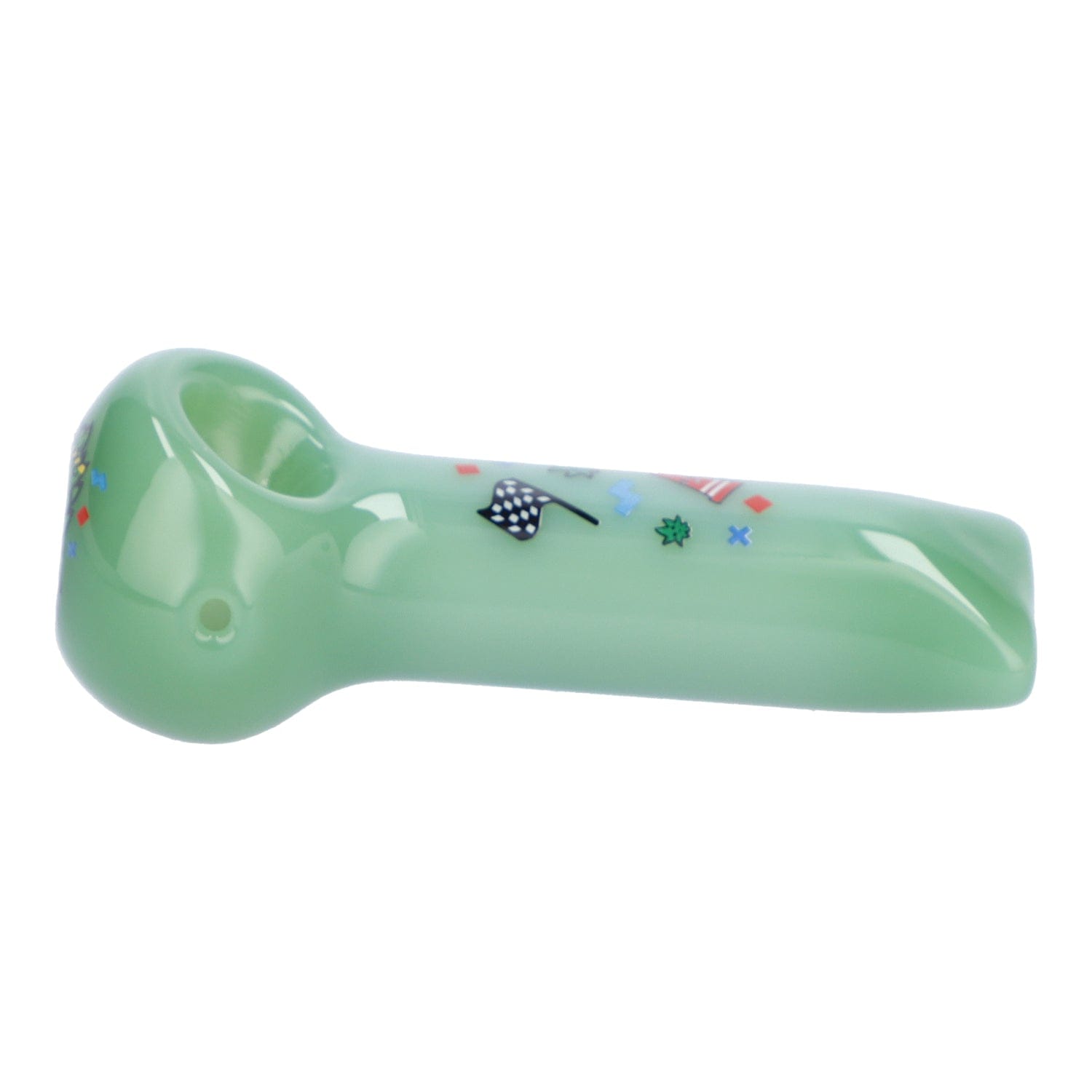 Side profile of the Famous X 4" Sour Diesel Hand Pipe - Milky Green showing a glossy pale green glass spoon pipe with small colorful decals on a white background