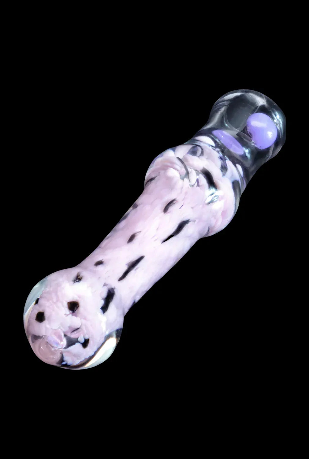 Diagonal close-up of a pale lavender and clear glass DHC Frit Cone One Hitter - 3 in. resting on a black background, showing its rounded ends and internal fritted texture