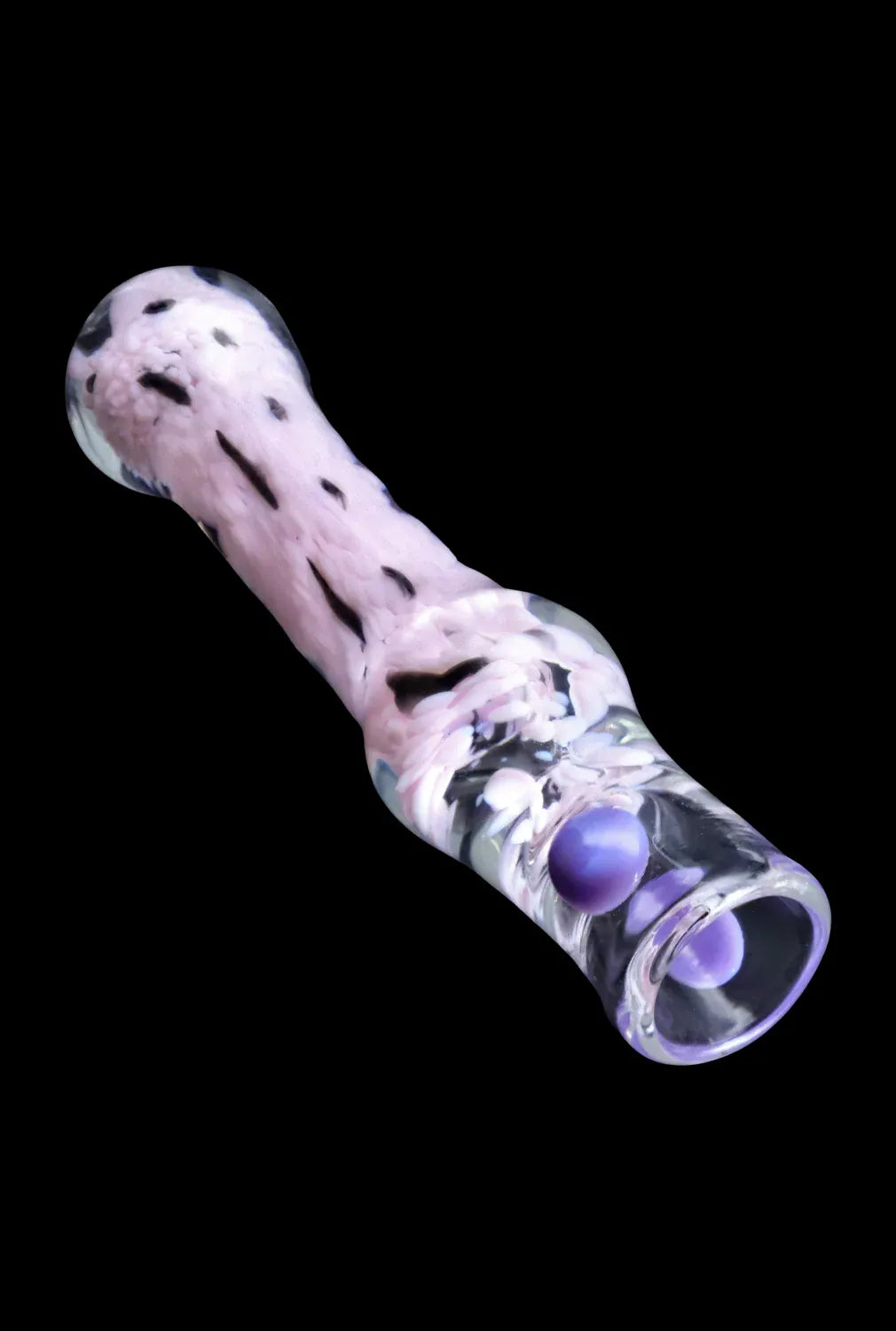 Angled close-up of the DHC Frit Cone One Hitter - 3 in. showing a pink swirled glass body with black specks and purple glass marbles against a black background