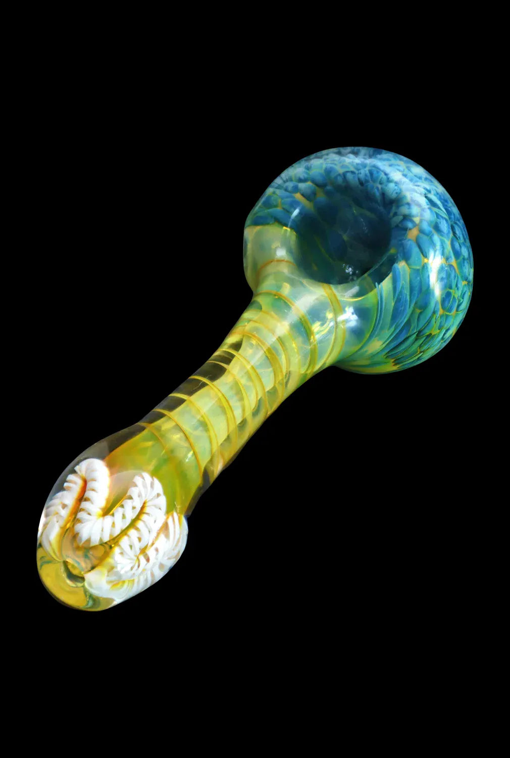 Angled close-up of the DHC Twisting Frit Spoon Pipe - 3 in., showing its greenish-yellow twisted stem and blue frit-patterned bowl against a black background