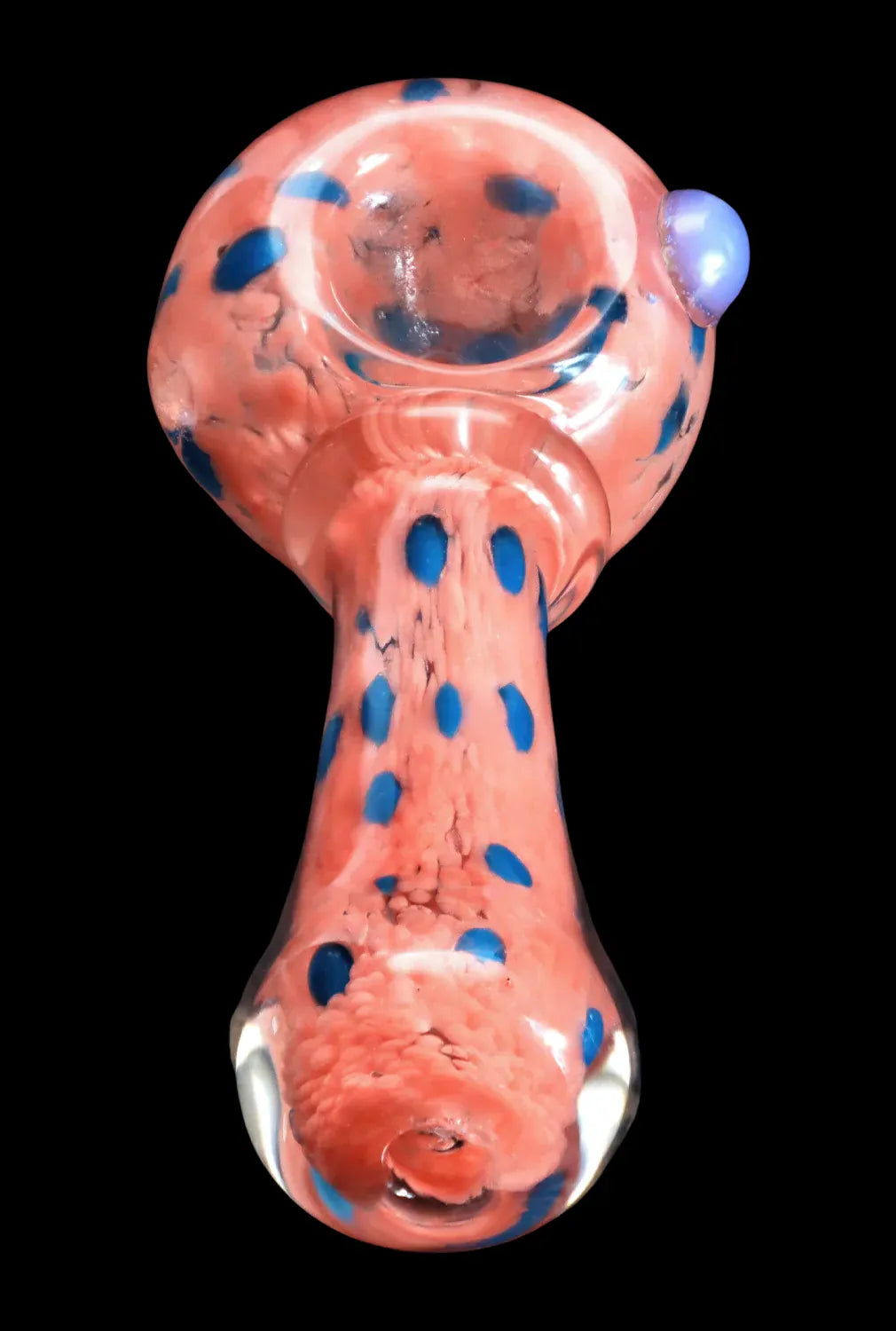 Top-down view of the DHC Frit with Twisted Mouthpiece Spoon Pipe - 4 in., showing a coral glass body with scattered blue spots and a raised purple carb on a black background