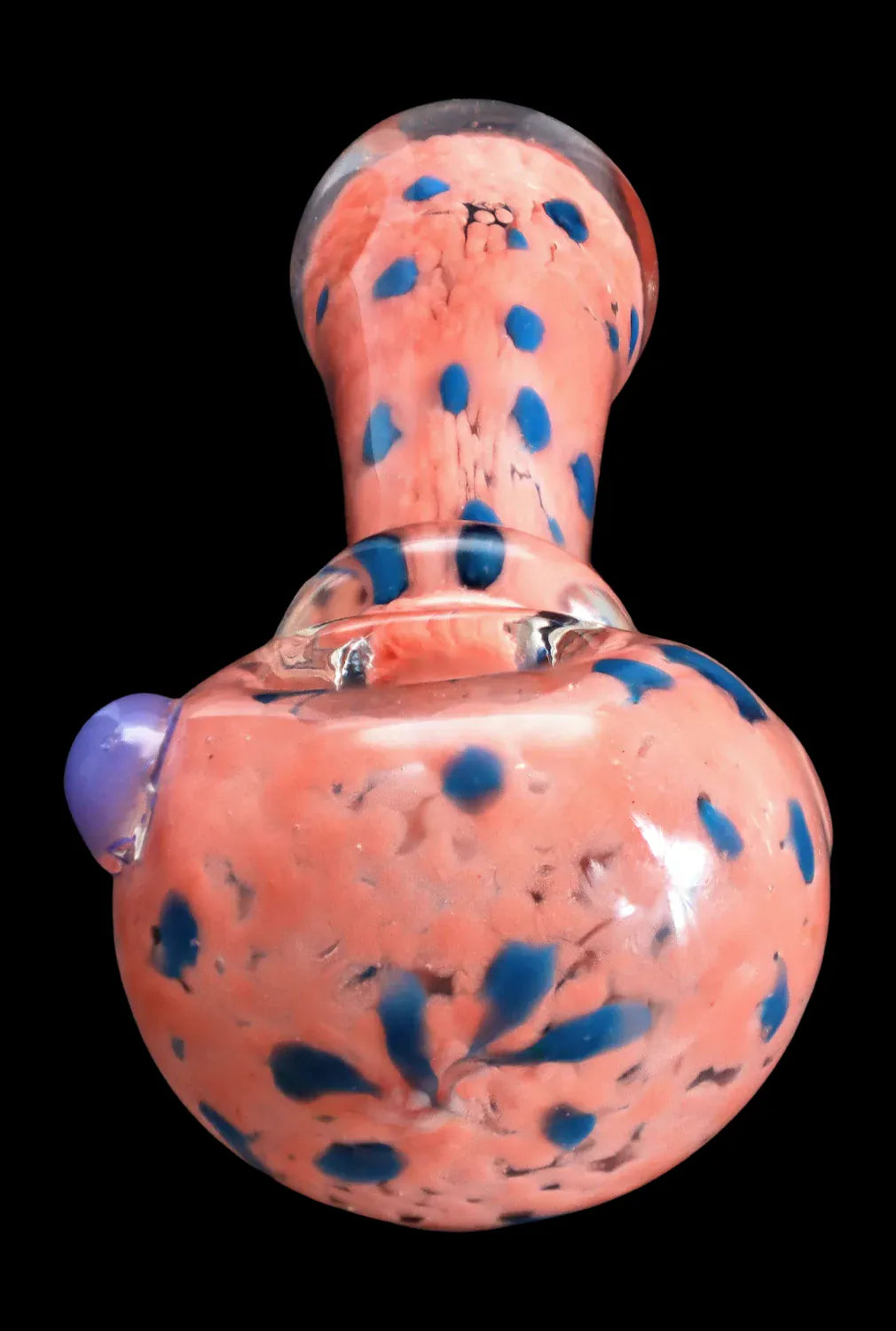 Top-down close-up of the DHC Frit with Twisted Mouthpiece Spoon Pipe - 4 in. showing a pink glass body with scattered blue frit spots and a clear twisted mouthpiece.
