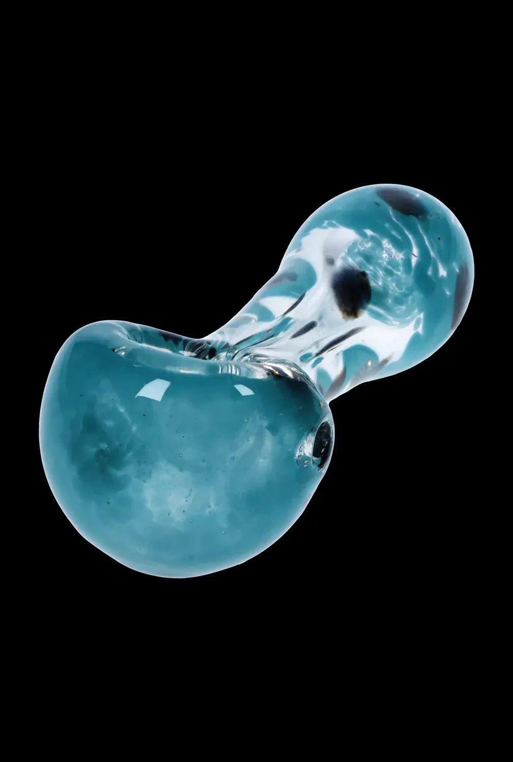 Angled close-up of the teal glass DHC Color Frit with Dots Spoon Pipe - 2.5 in., showing its bulbous bowl, swirled frit patterns, and glossy reflections on a black background