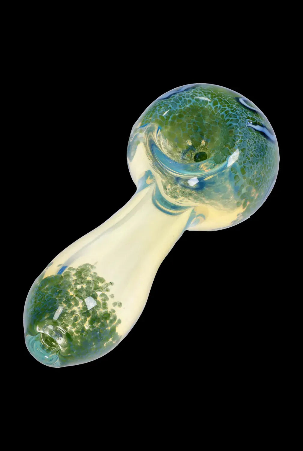 Angled top-down view of the DHC Frit Fumed with Piping Spoon Pipe - 2.5 in., showing a pale glass body with green frit clusters and a glossy, rounded bowl against a black background
