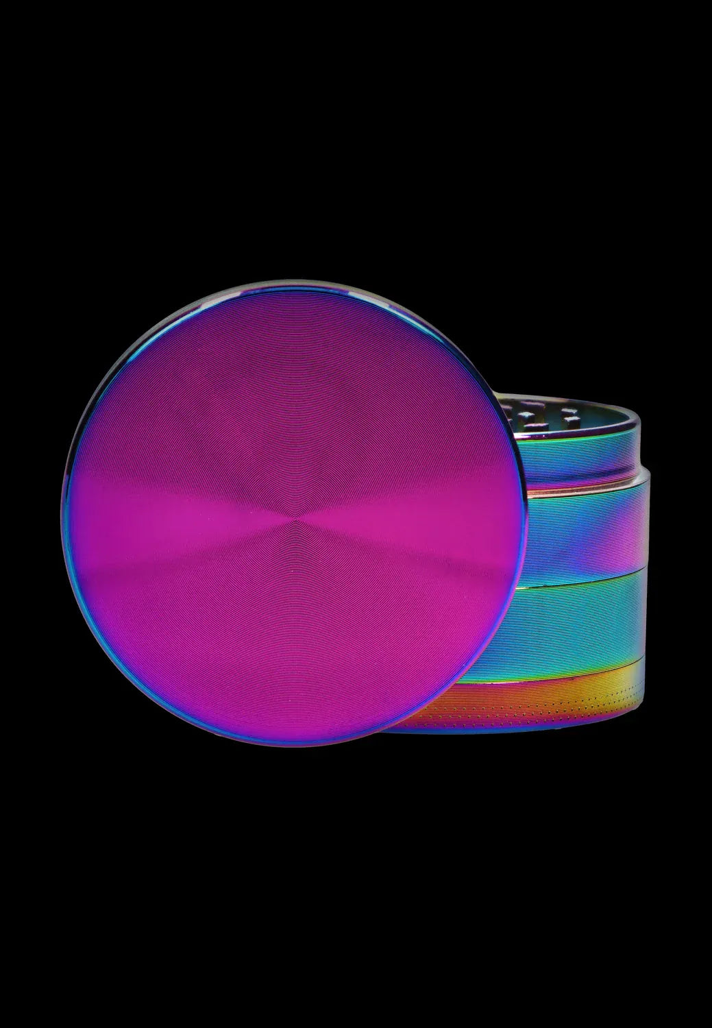 Close-up front and side view of a rainbow-finished DHC Grooved 3-Stage Grinder - 52mm resting on its side against a black background.
