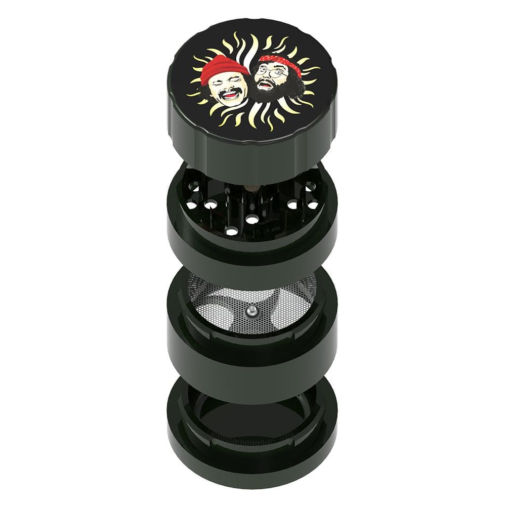 Top-down view of the Up In Smoke 40th Anniversary 53mm 4-Piece Grinder showing its four separated black metal sections and a sun-faced logo on the lid.