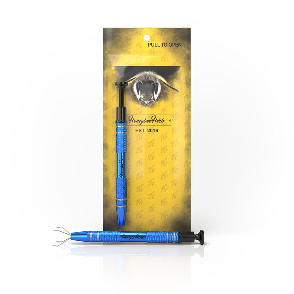 Front view of the Honeybee Herb Dab Claw showing a metallic blue claw tool against yellow branded packaging.