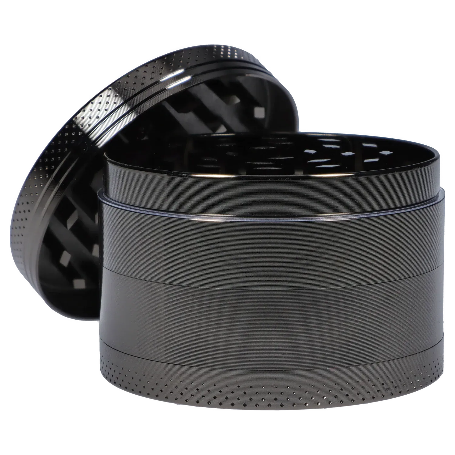 Close-up, angled view of the opened 63mm Chrome with Tiny Glowing Mushrooms Grinder showing textured black metal sides and perforated lid teeth.