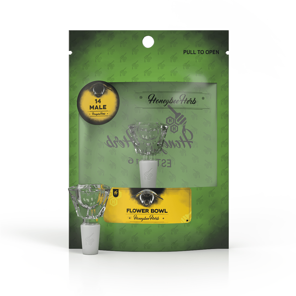 Front-facing shot of the Honeybee Herb Glass Flower Bowl (Fb-4) in its green hang-tab pouch with the clear faceted glass bowl visible through the window.