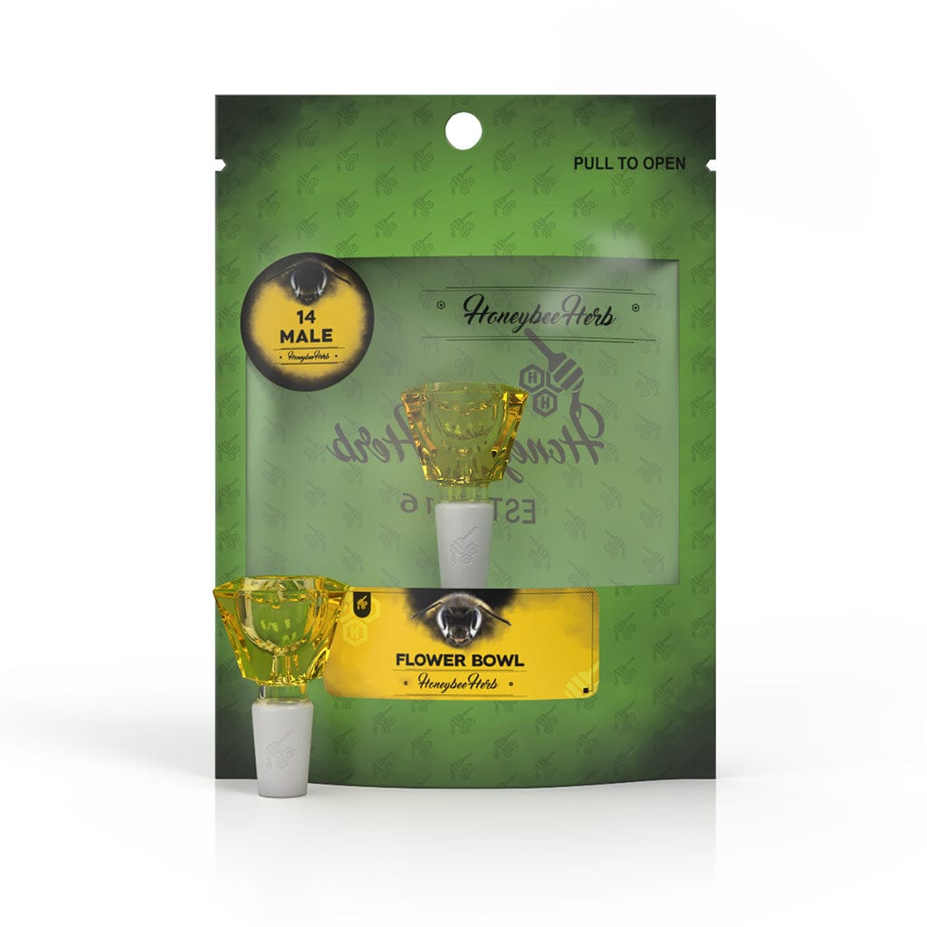 Front view of the Honeybee Herb Glass Flower Bowl (Fb-4) in yellow glass set against its green branded packaging with a white joint.