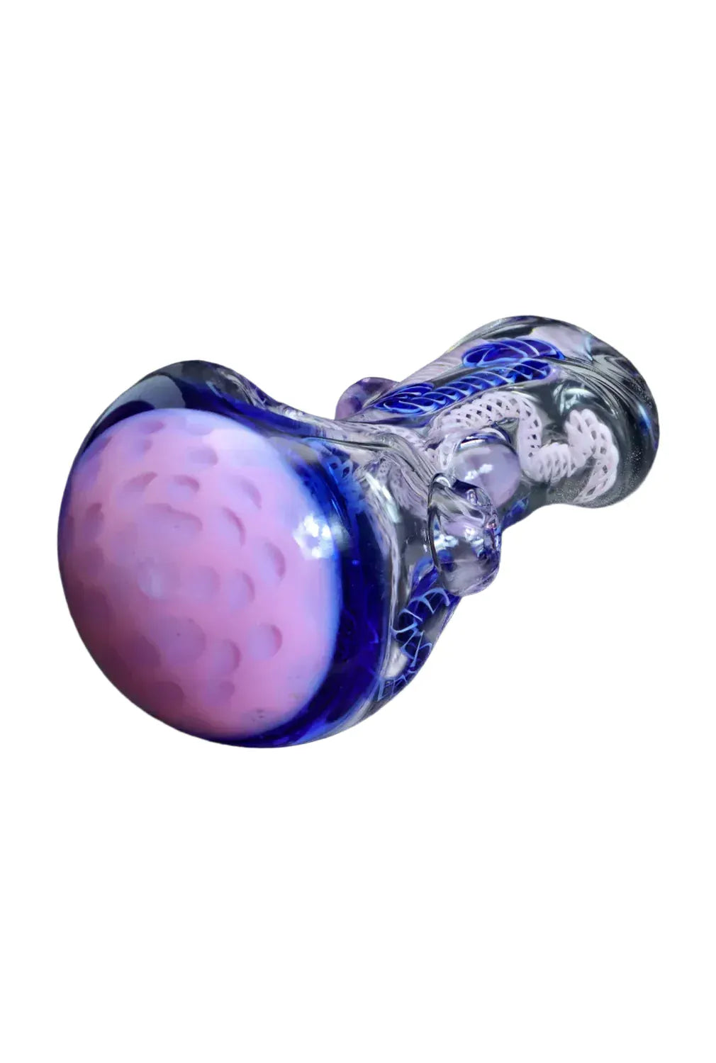 Angled close-up of the DHC Mix Color Spoon - 4.5 in. showing a rounded pink bowl with dimpled texture and a clear blue-accented glass handle.