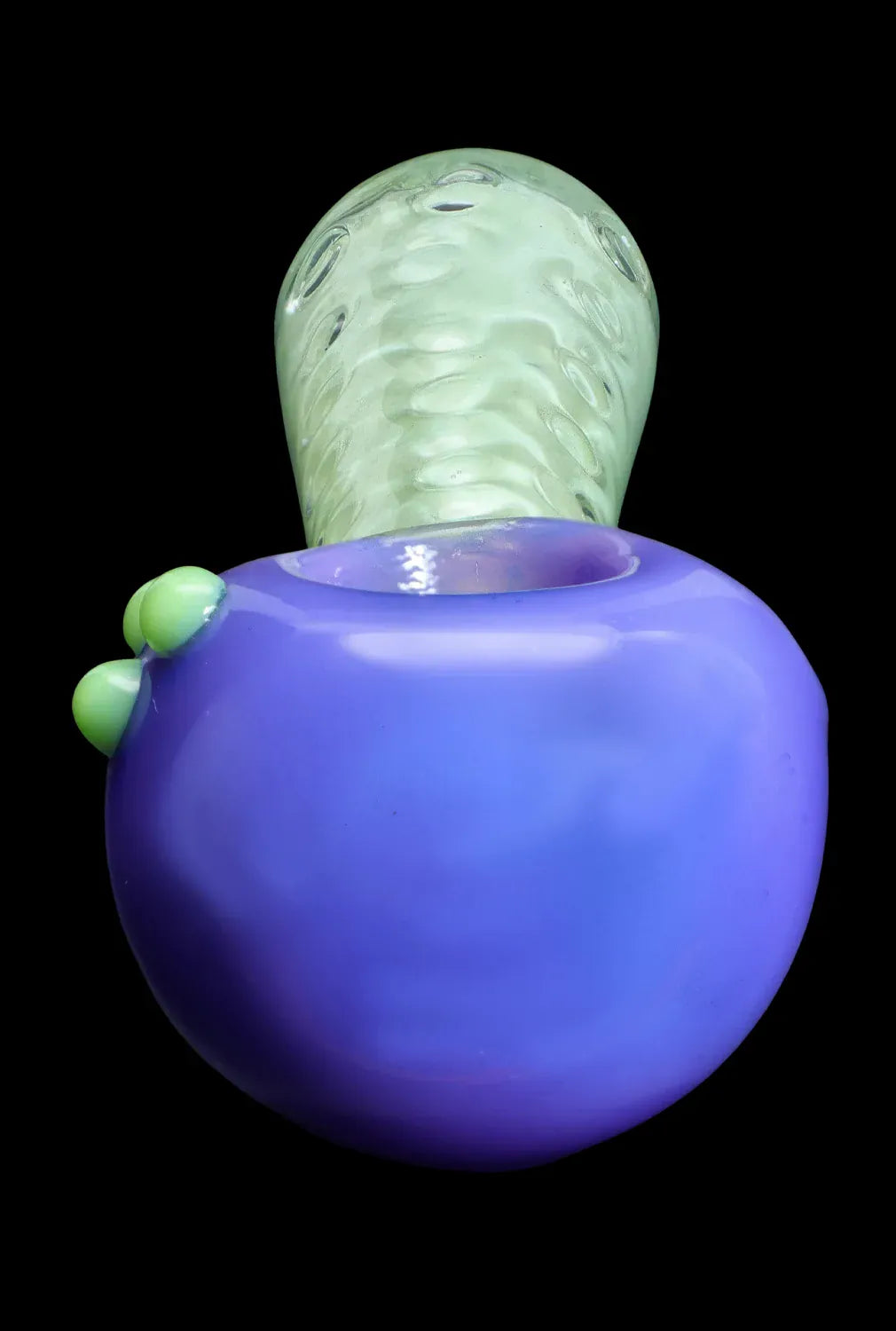 Close-up front view of the DHC Fancy Stem Spoon Pipe - 4.5 in., showing a purple rounded bowl with green accent knobs and a textured pale green stem against a black background.