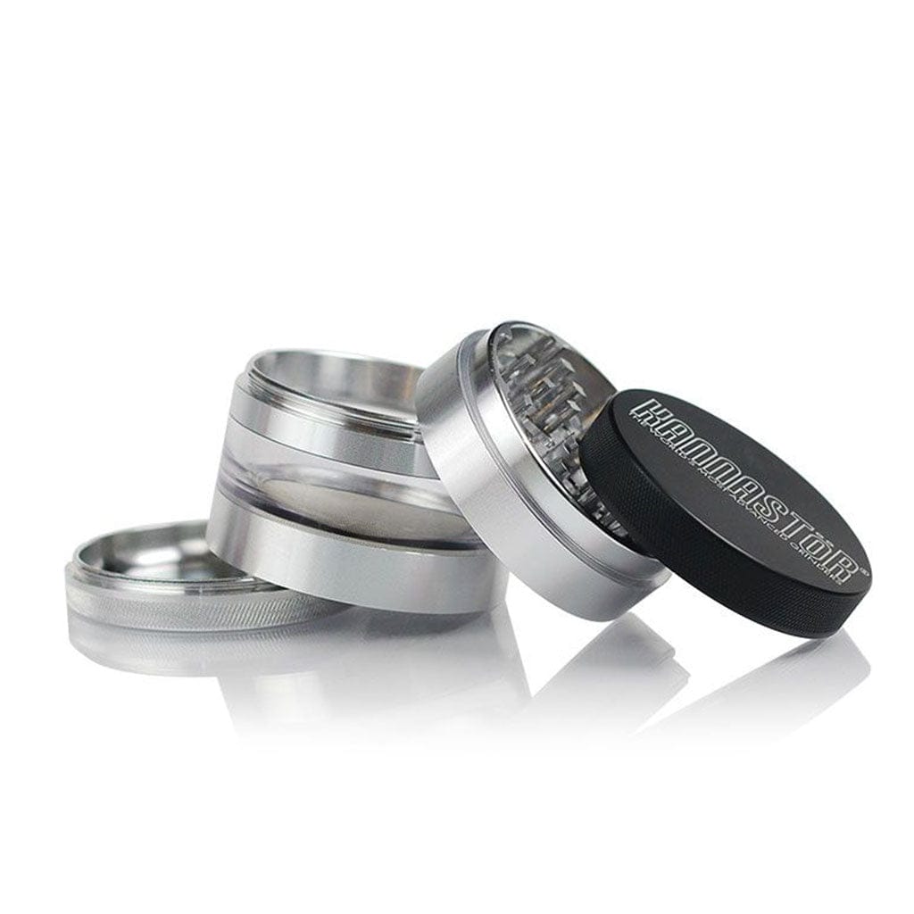 Angled close-up of the Ryot 4Pc Jar Body Grinders set showing three silver metal sections and a black branded top on white background.