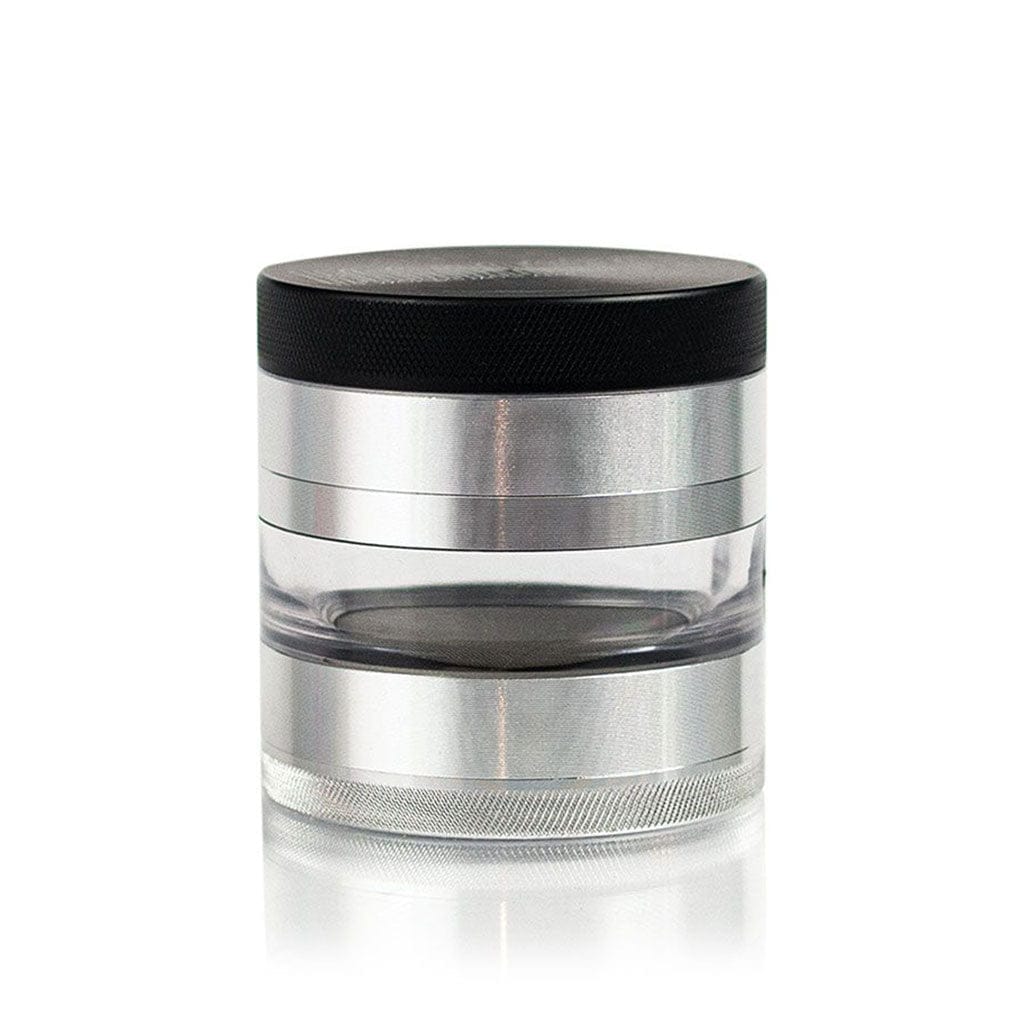 Centered front view of a silver and clear cylindrical Ryot 4Pc Jar Body Grinders with a textured black top against a white background.