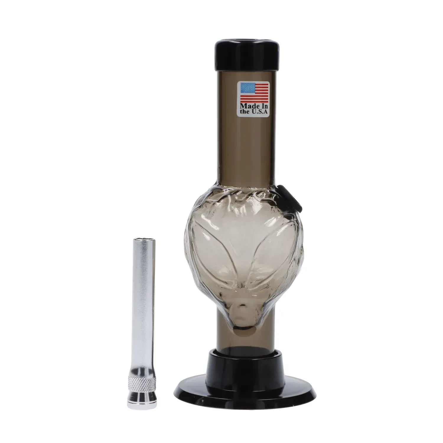 Front view of the JM Plastics Mini Alien Base Acrylic Bong - 6 in. showing a smoky alien-face bulb on a tan neck with a black cap and base against a white background