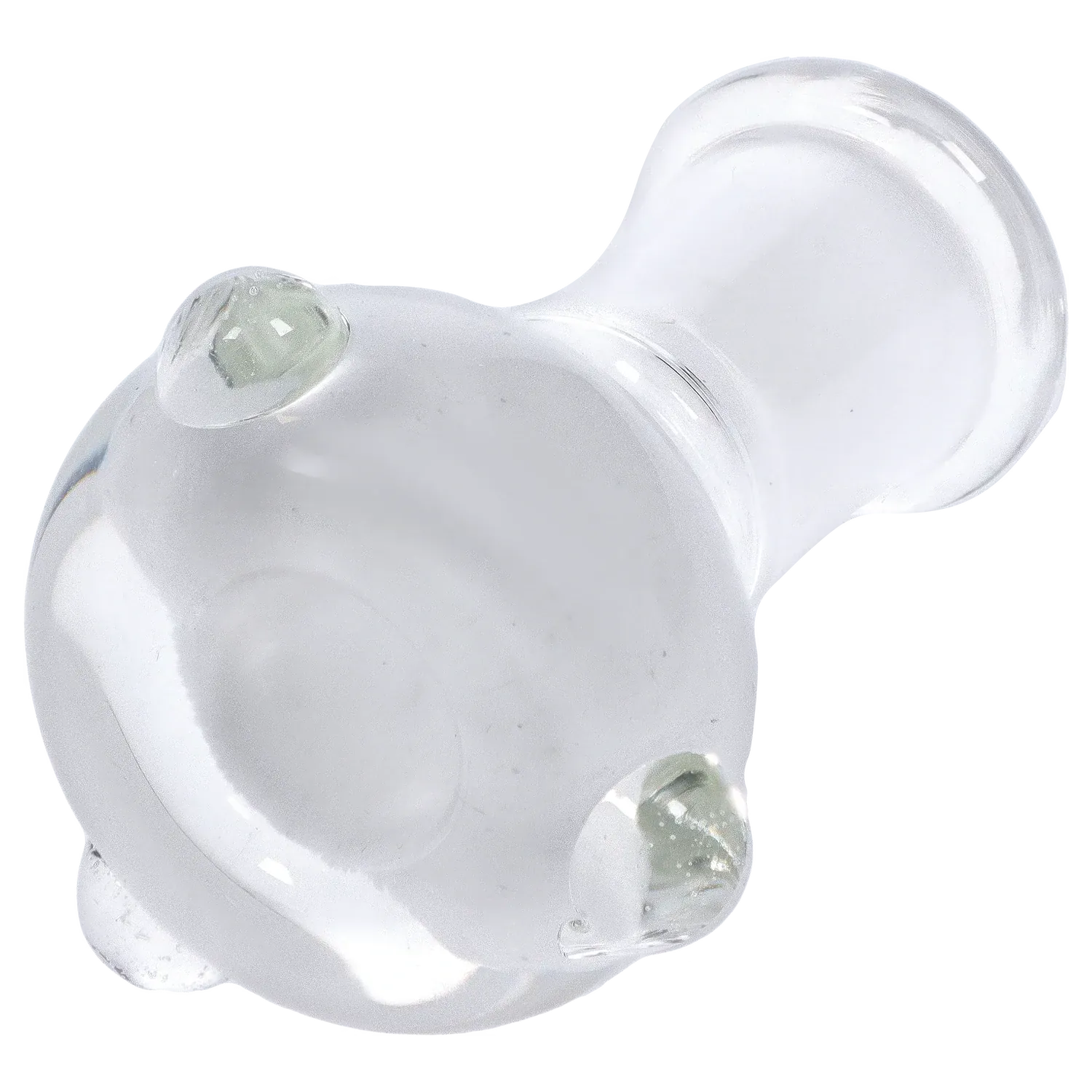 Close-up angled view of the clear DHC Inside-Out Frit Bowl showing its rounded, glossy glass surface with three raised frit dots and soft studio lighting.