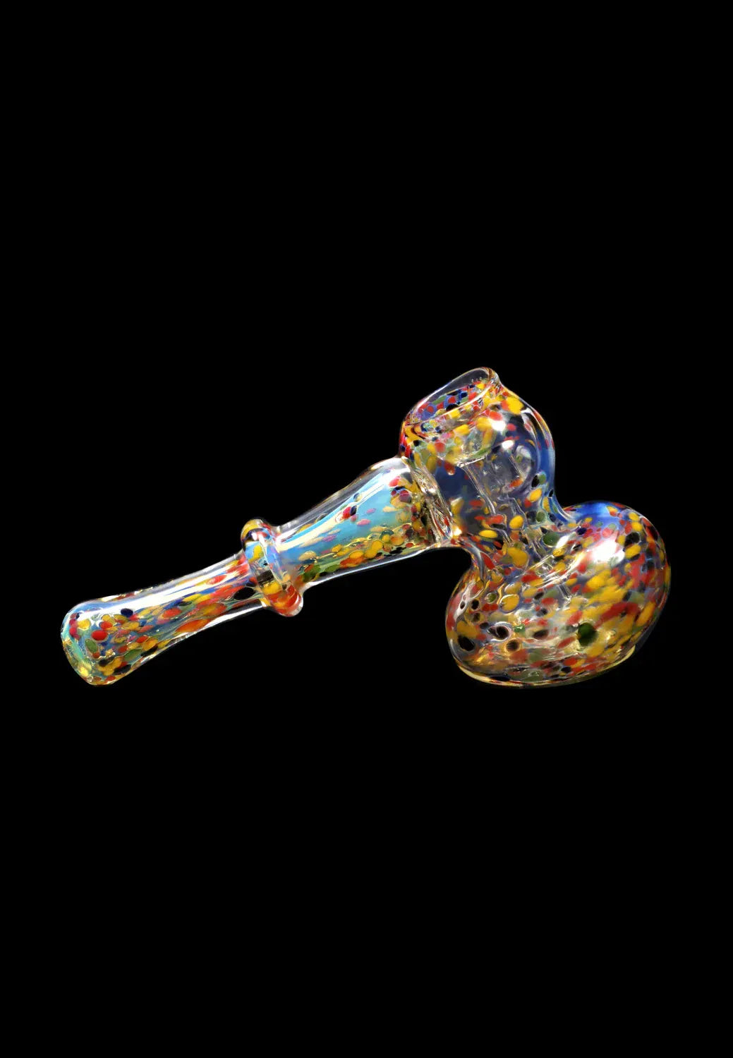 Angled close-up of the DHC Rainbow Frit Hammer Bubbler - 5 in. showing its colorful speckled glass head and flared handle against a black background