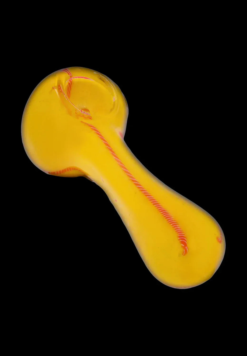 Angled top-down view of the DHC Frit Glass with Rasta Line Spoon Pipe - 4.5 in., a yellow glass spoon pipe with a red twisted line down its center on a black background