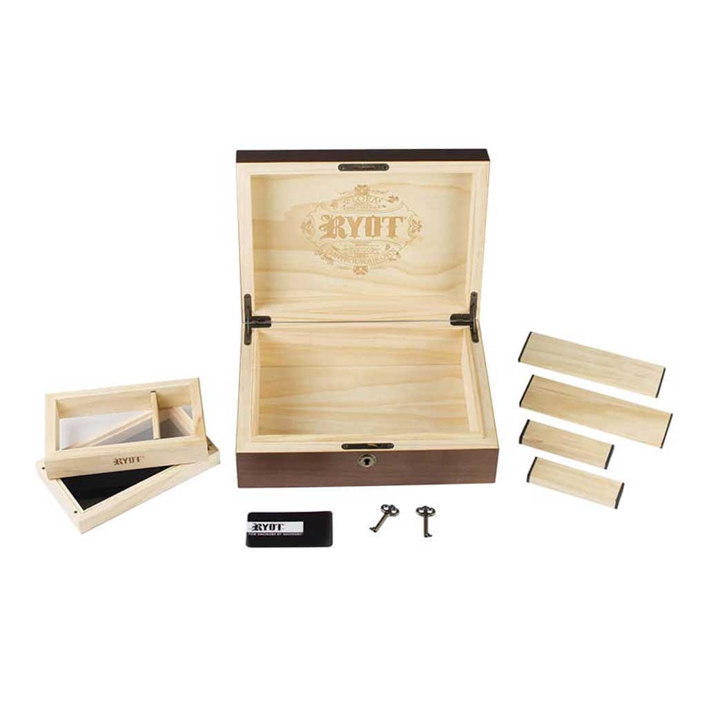 Top-down view of the open Ryot Humidor Walnut Combo Box showing its light wood interior, branded lid engraving, removable dividers, two keys, and accessories.