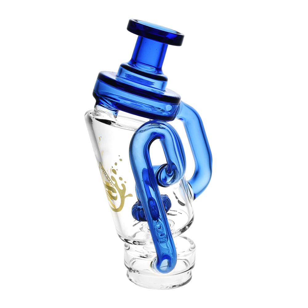 Diagonal studio shot of the Pulsar Puffco Peak/Pro Recycler Attachment #2 -6.75"/Clrs Vry showing a clear glass body with bright blue looping recycler tubes and top against a white background