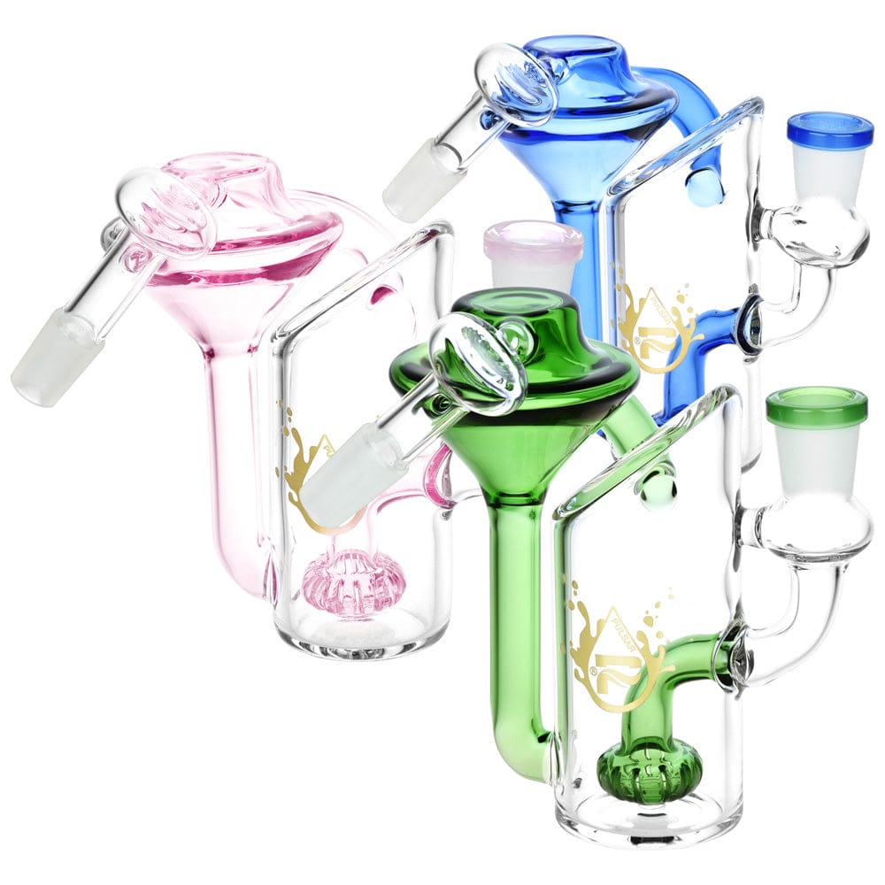 Three-quarter view of three colorful Pulsar Alchemist Recycler Ash Catcher | 14Mm | 5" | Colors Vary units (pink, blue, green) arranged overlapping on a white background, showing their angled inlets and internal recyclers.