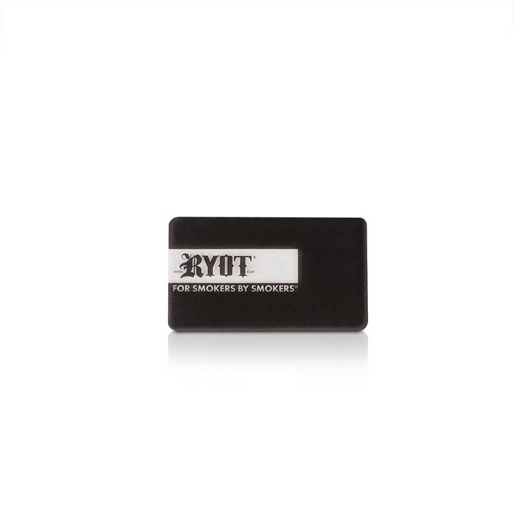 Centered front view of the Ryot Humidor Walnut Combo Box showing a black rectangular case with a white Ryot logo panel and soft shadow below