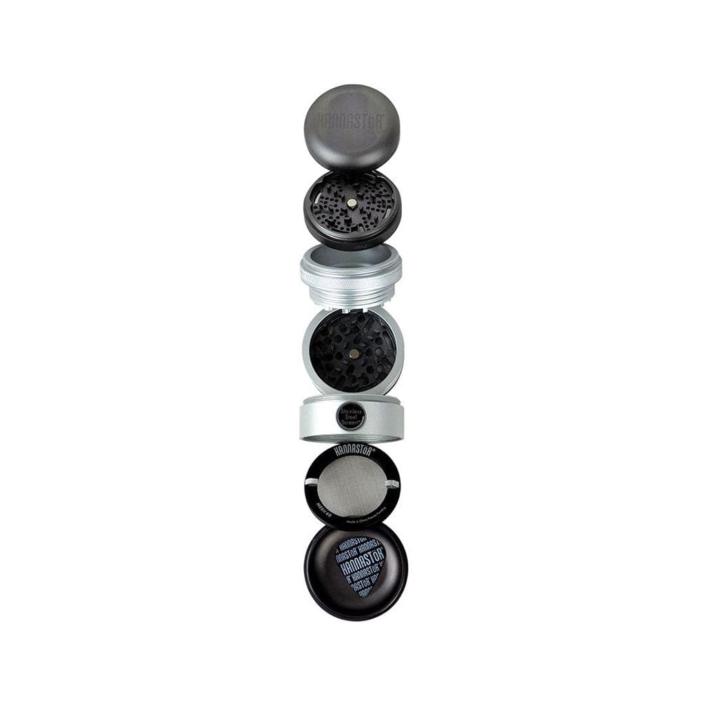 Vertical exploded view of the Ryot Gr8Tr Solid Body Grinder showing each stacked metal and mesh chamber separated against a white background.