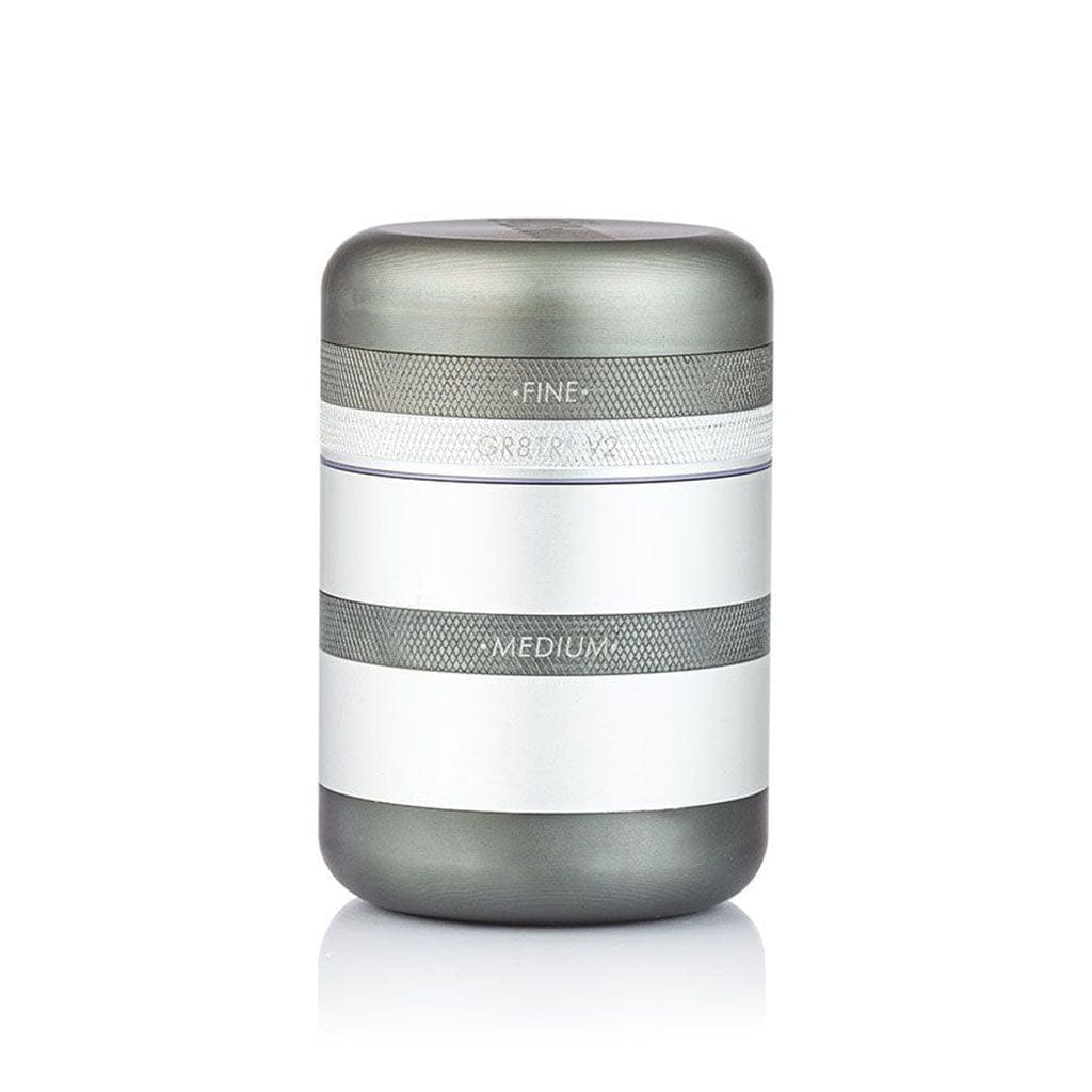 Centered front view of the matte black Ryot Gr8Tr Solid Body Grinder showing stacked cylindrical sections with knurled bands labeled "FINE" and "MEDIUM" on a white background.