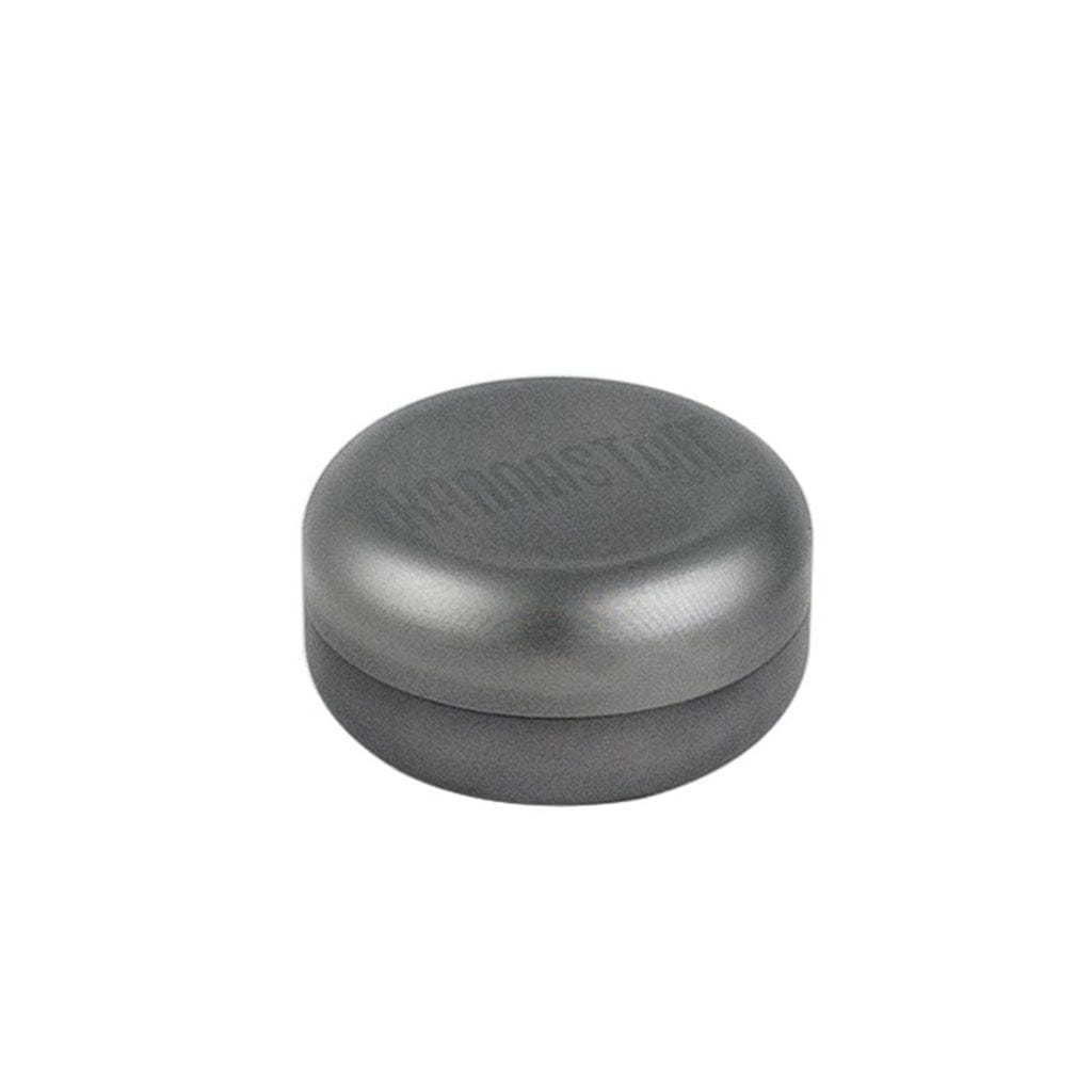 Centered front-angle view of a matte gunmetal Ryot Gr8Tr Solid Body Grinder resting on a white background.