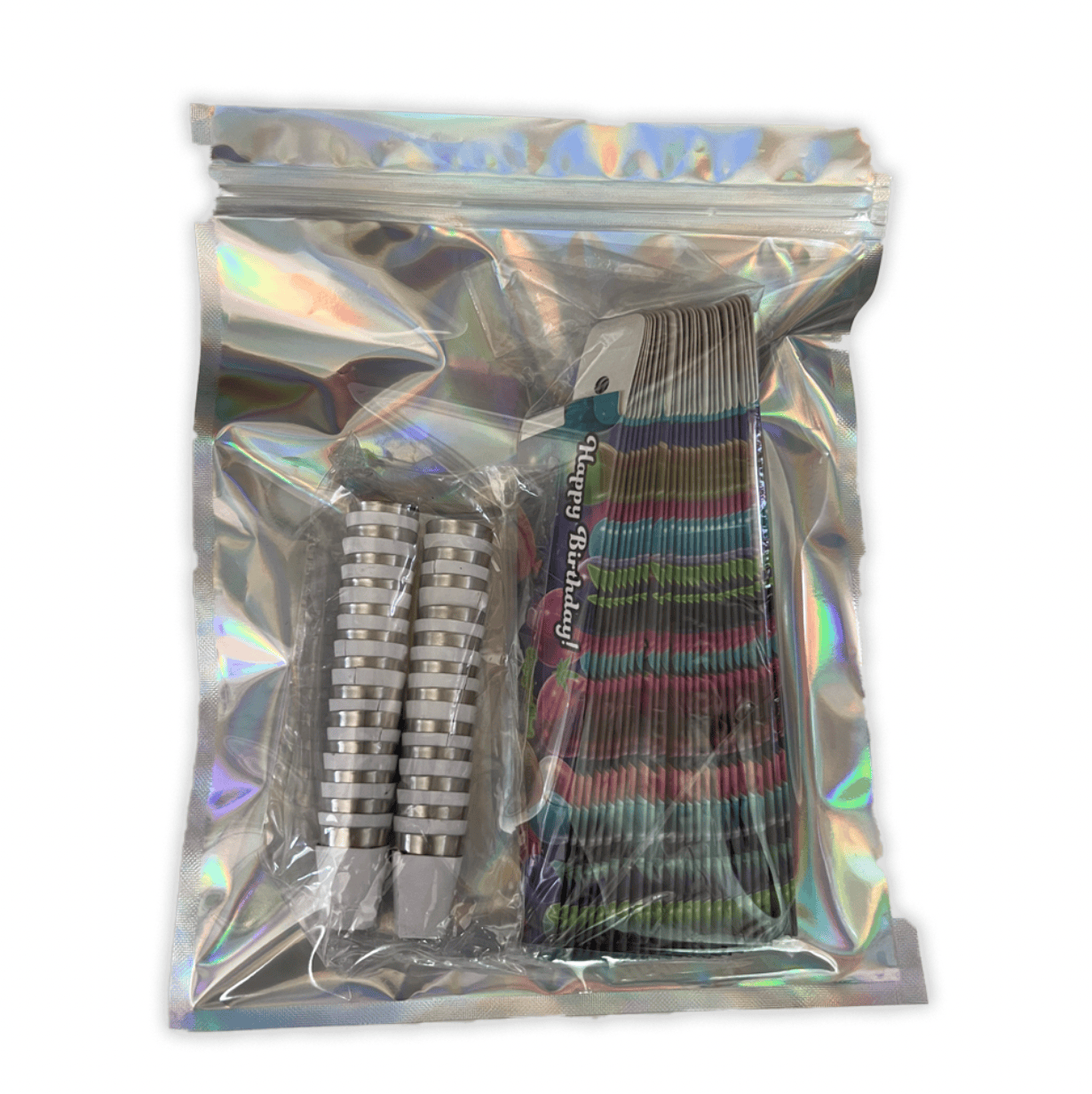Top-down view of a holographic zip bag containing The Dispoze-a-Bowl® "HAPPY BIRTHDAY" Party Favors 25-Pack with stacked metallic mouthpieces and a fanned set of colorful striped cardboard tubes.