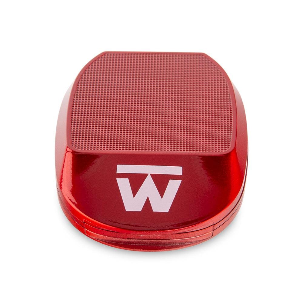 Close-up front view of a glossy red Truweigh Sonic Scale with textured top surface and white "W" logo on a white background