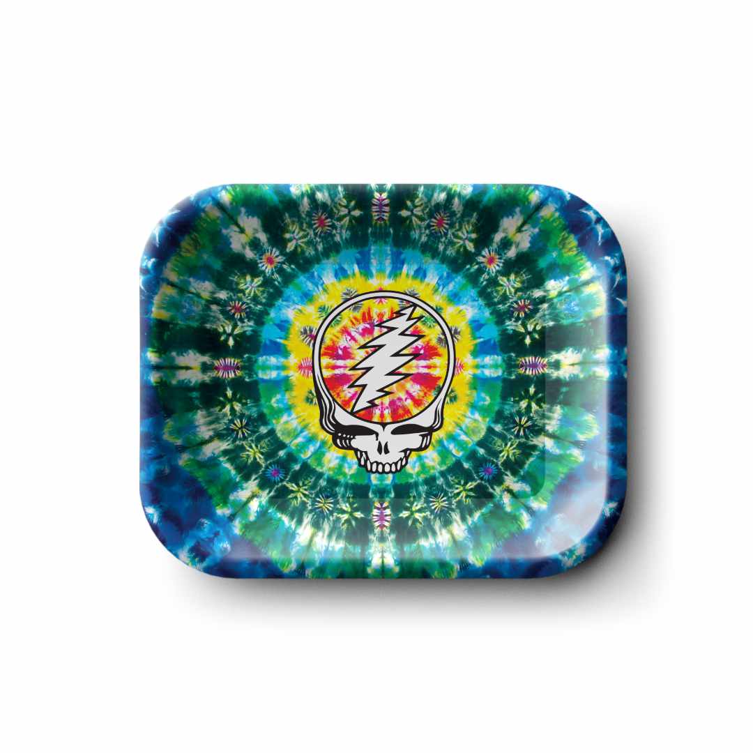 Top-down view of a small Blazy Susan Grateful Dead Metal Rolling Tray - Small with a concentric green, blue, yellow tie-dye pattern and a central Stealie skull logo.