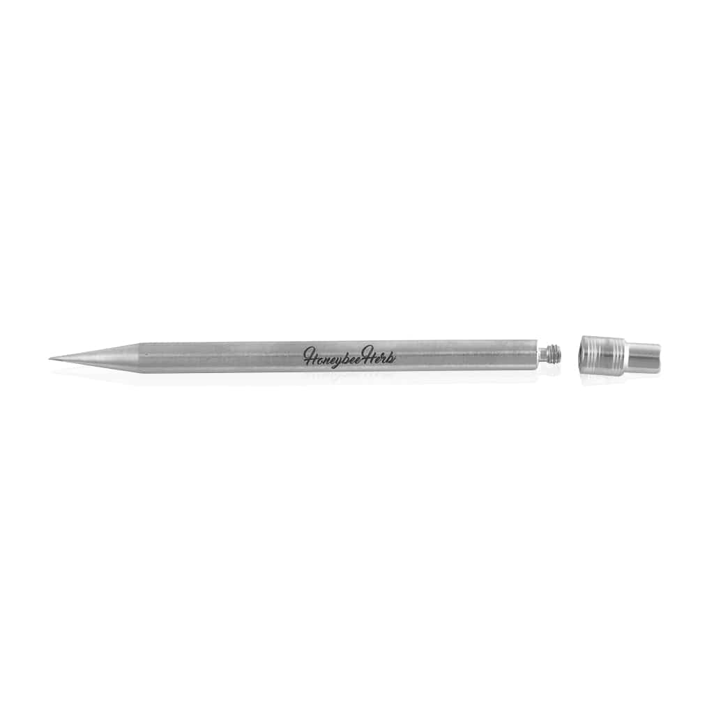Side view of the Honeybee Herb Titanium Pencil lying horizontally on white background with its threaded cap removed.