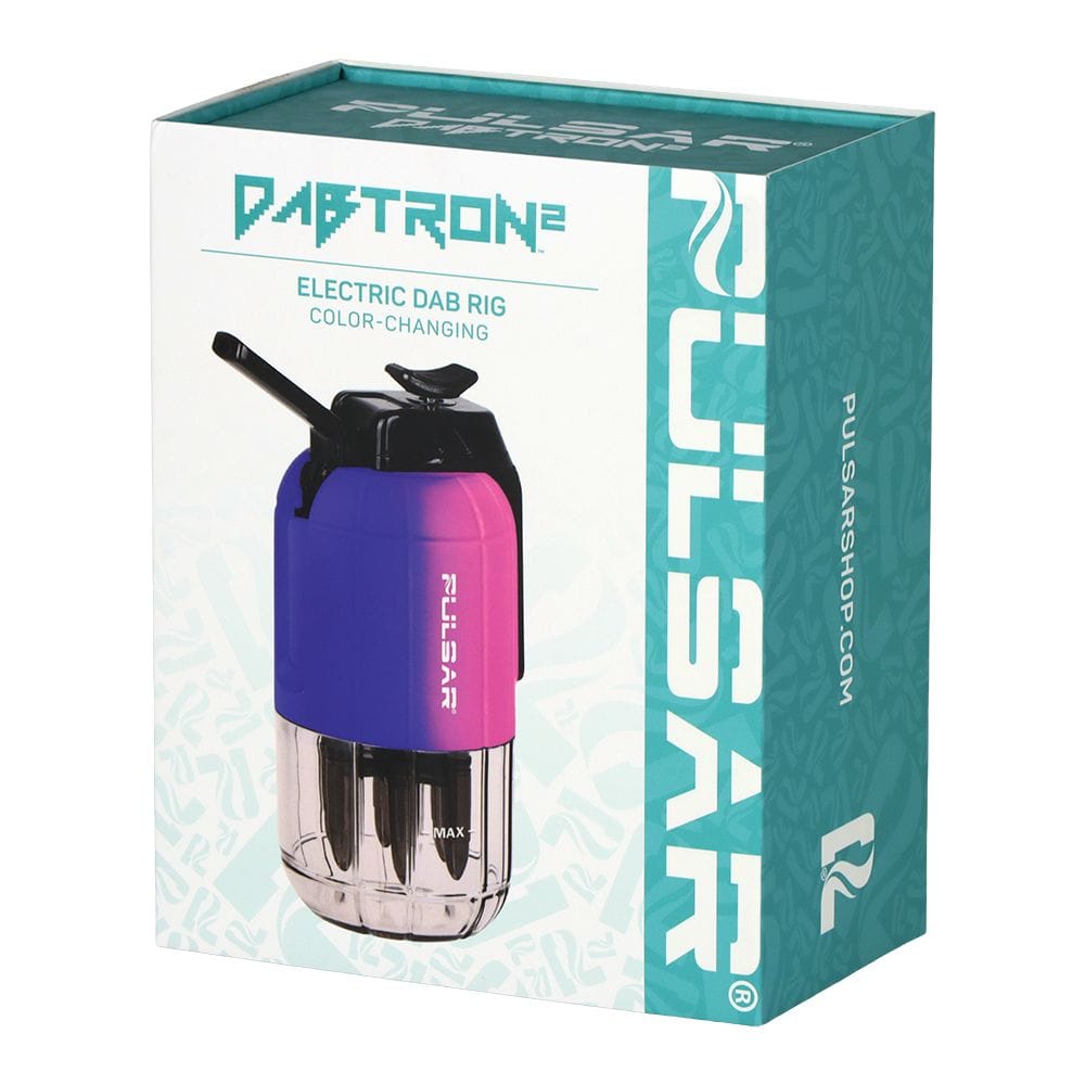 Three-quarter front view of the boxed Pulsar Dabtron 2.0 Electric Dab Rig | 1500Mah showing the teal packaging and a color-changing purple-to-pink device image.