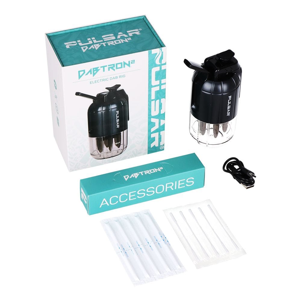 Top-down view of the Pulsar Dabtron 2.0 Electric Dab Rig | 1500Mah with its teal-branded box, black rig, accessories box, USB cable and sealed tools arranged on white.