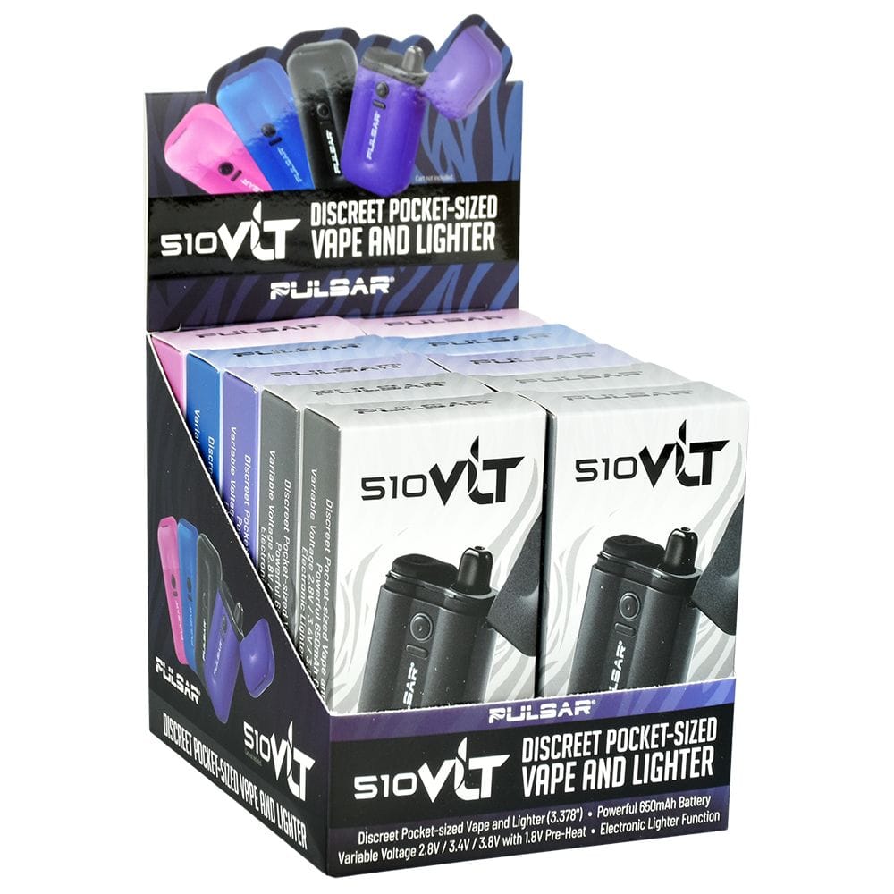Angled three-quarter view of a countertop display of Pulsar Vlt 510 Battery Vaporizer / Lighter | 650Mah boxed units, showing rows of white retail boxes and colorful product photos.