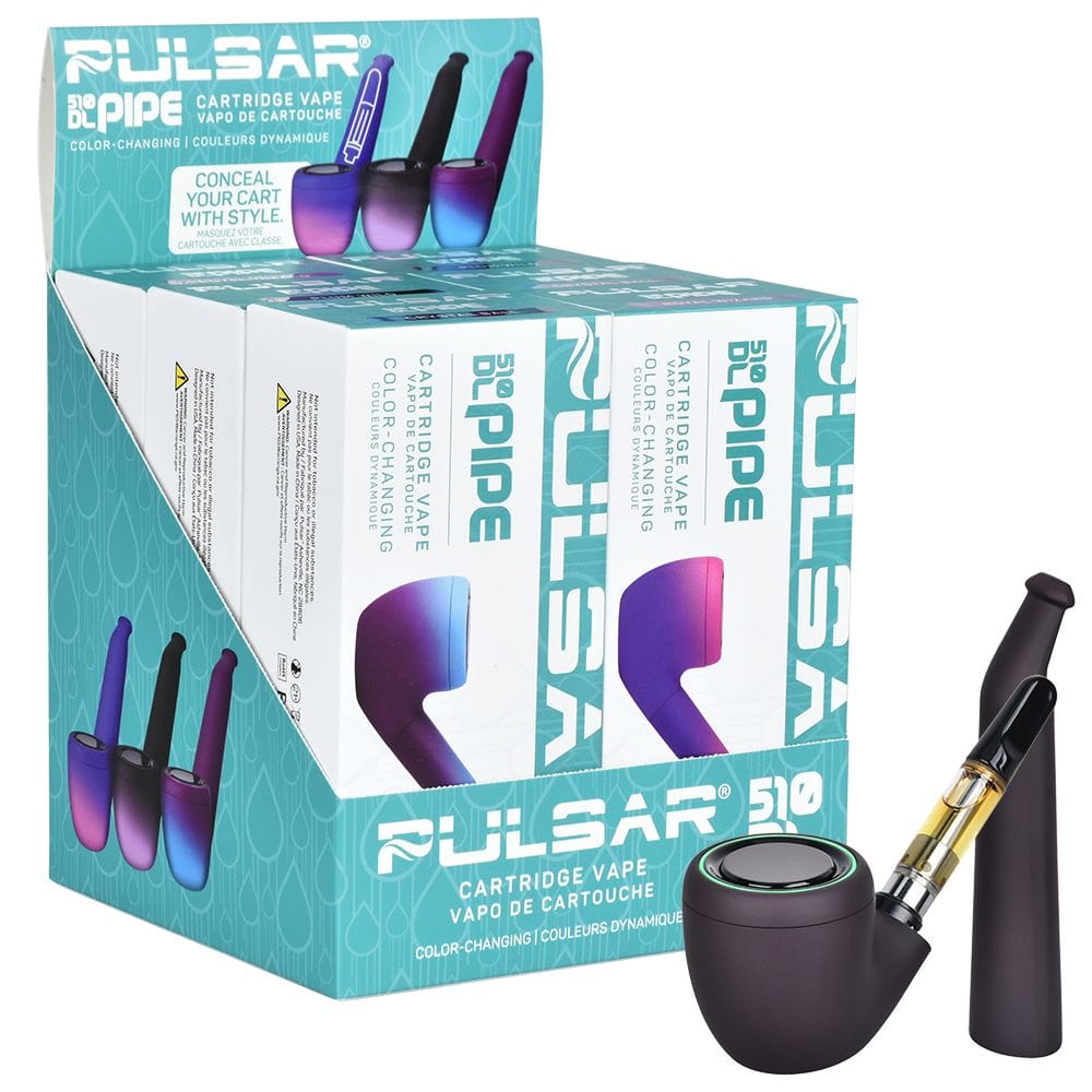 Angled product shot of a matte black Pulsar 510 Dl Pipe Variable Voltage Cartridge Vape | Thermo Series | 650Mah with its curved bowl and cartridge shown beside a teal branded countertop display box.