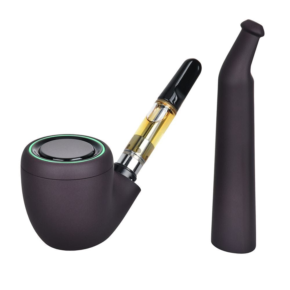 Angled studio shot of the Pulsar 510 Dl Pipe Variable Voltage Cartridge Vape | Thermo Series | 650Mah showing the matte dark brown bowl with glowing green ring and inserted clear cartridge.