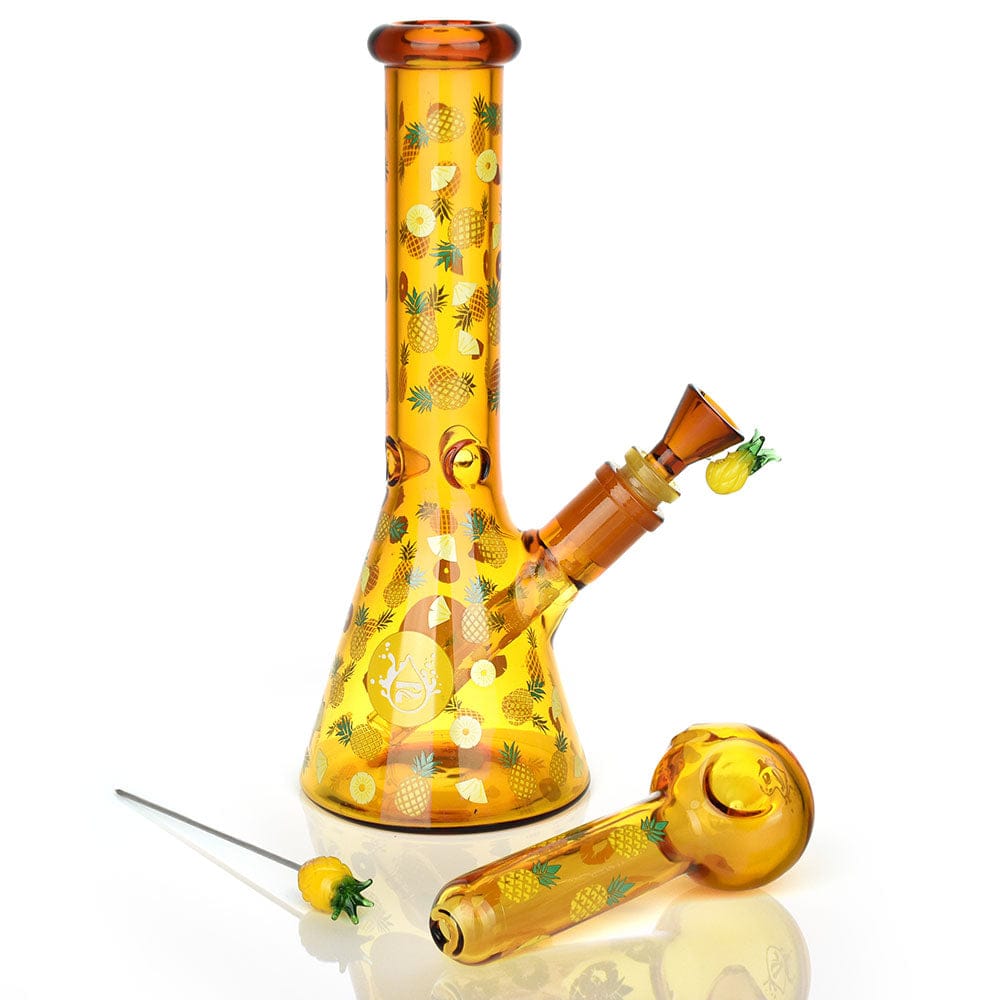 Studio front view of the amber Pulsar Fruit Series Pineapple Express Herb Pipe Glow Duo - 10" / 14Mm F with pineapple decals.