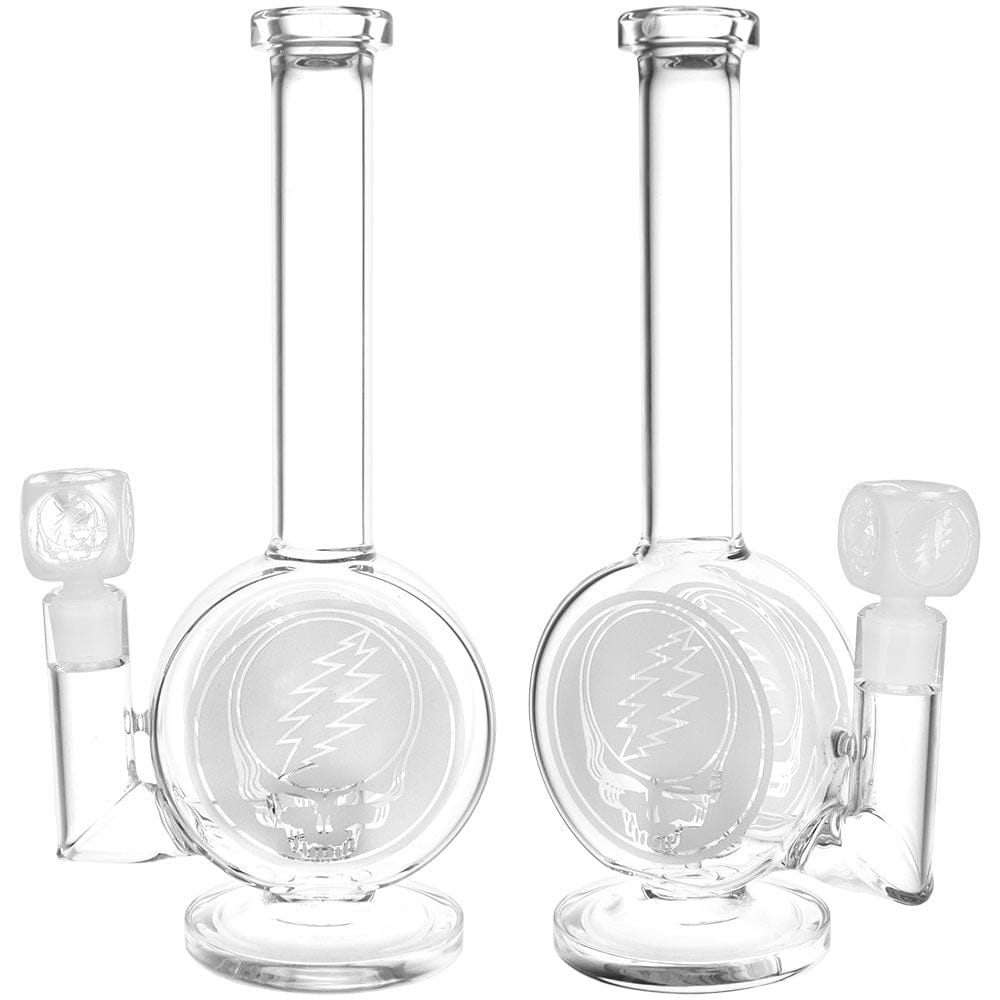 Front-facing studio shot of the Grateful Dead X Pulsar Round Steal Your Face Water Pipe - 14.5" / 19Mm F showing two clear glass tubes with round bodies etched with the Steal Your Face skull logo.