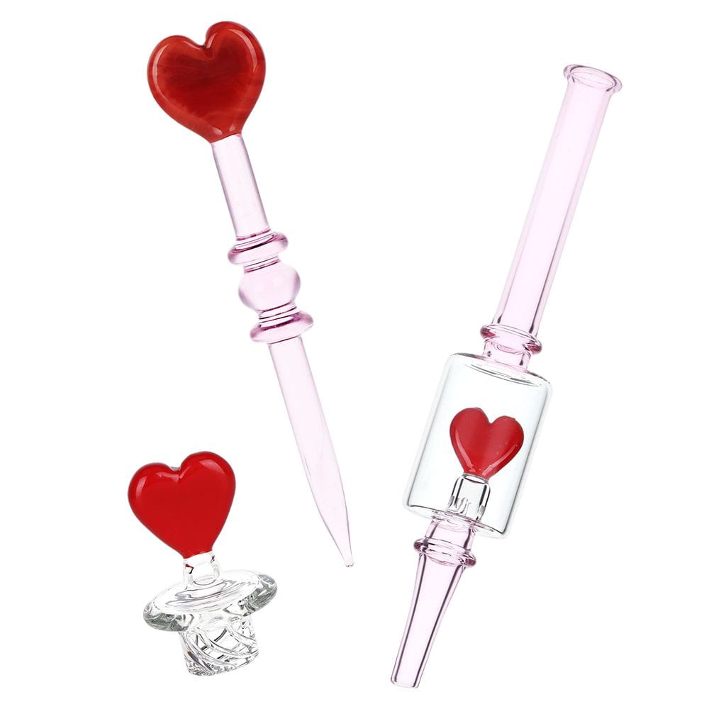Angled studio shot of the Pulsar Valentine'S Love Hearts Glass Dab Rig Set - 8.5" / 14Mm F showing three pink glass pieces with red heart accents on a white background