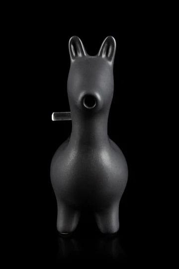 Front view of the Alpaca Bubbler, a dark-colored glass piece with a rounded shape and single stem.