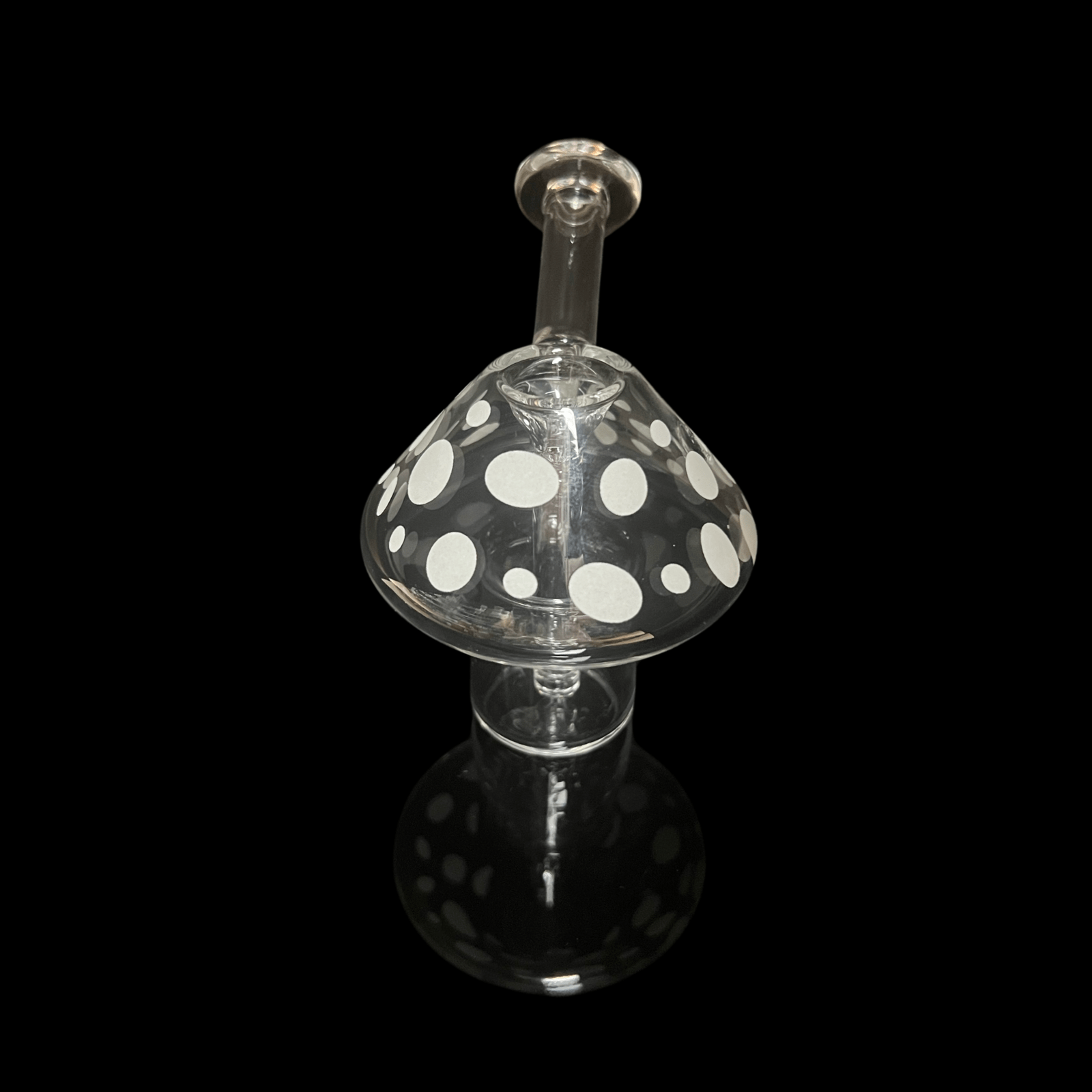 A front view of the “Mushroom” Glow-in-the-Dark Mini Bubbler, displaying its rounded shape and clear glass construction.